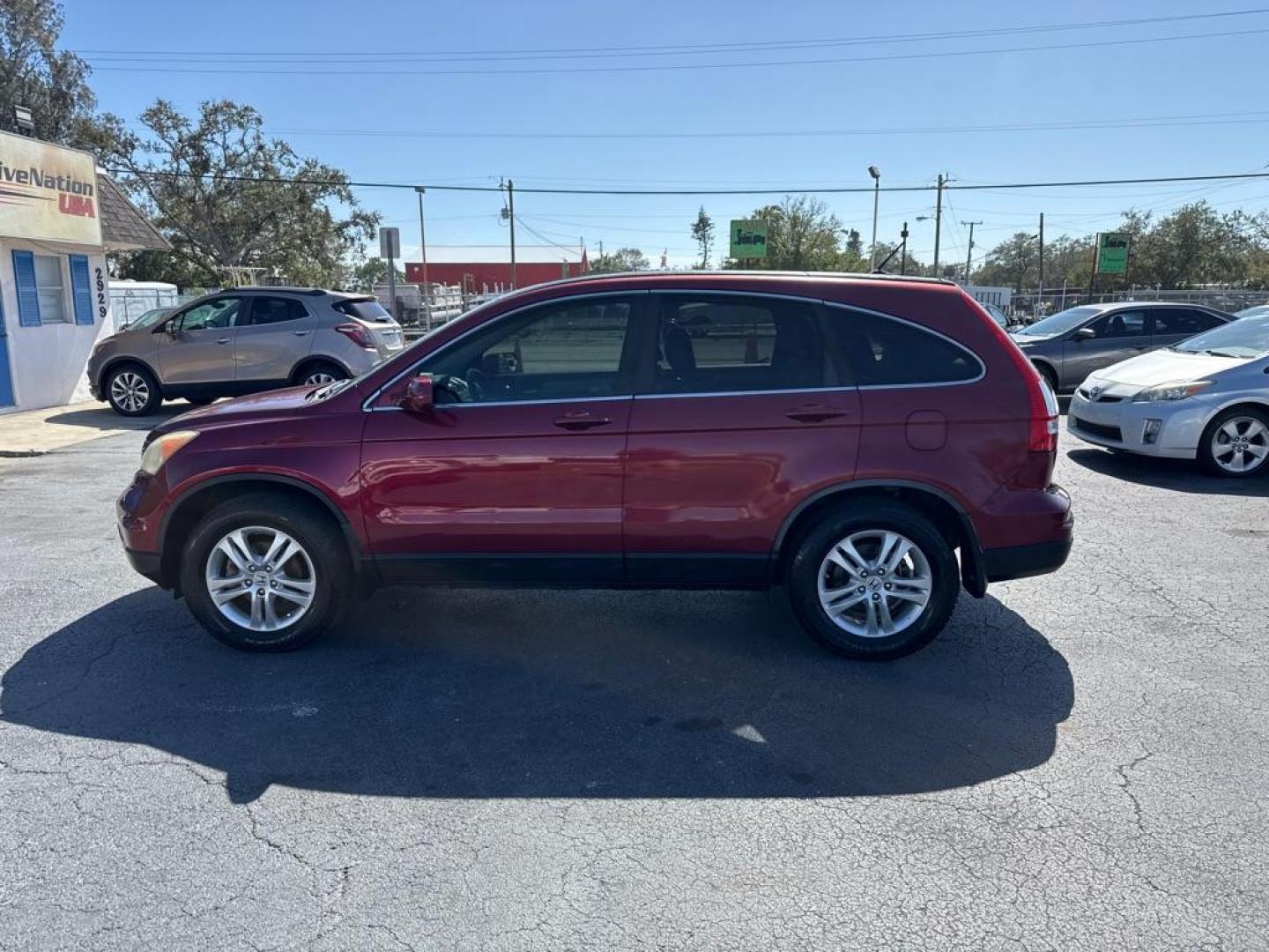 2011 RED HONDA CR-V EXL (5J6RE3H75BL) with an 2.4L engine, Automatic transmission, located at 2929 9th St. West, Bradenton, 34205, (941) 242-2810, 27.473591, -82.570679 - Photo#4