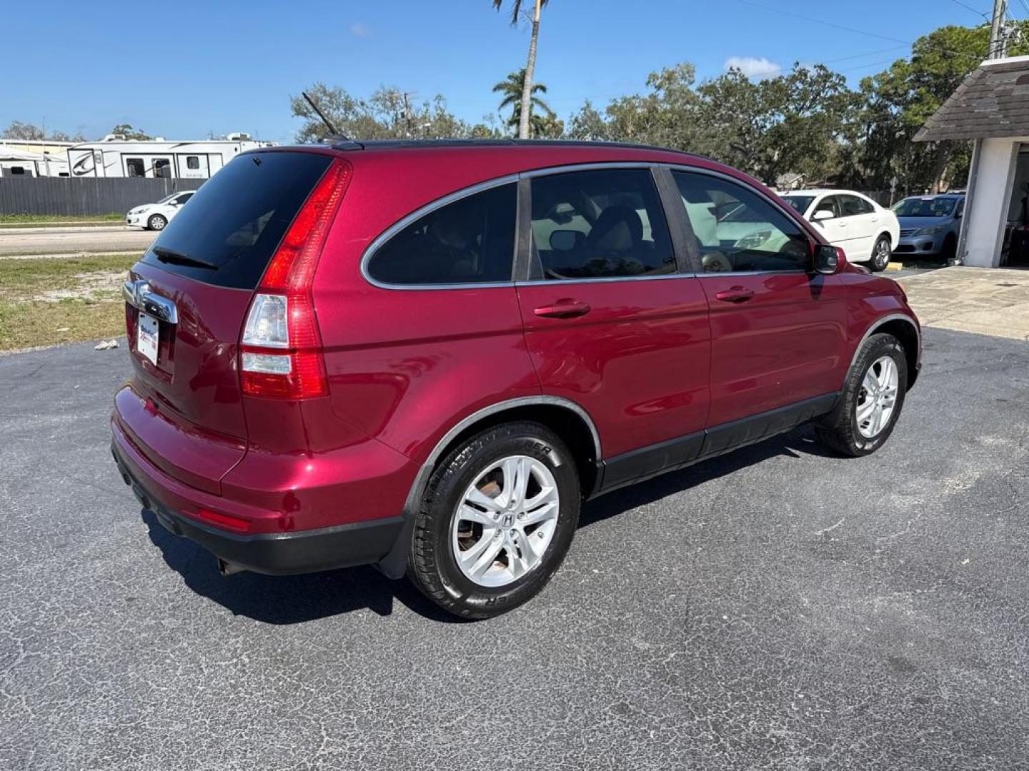 2011 RED HONDA CR-V EXL (5J6RE3H75BL) with an 2.4L engine, Automatic transmission, located at 2929 9th St. West, Bradenton, 34205, (941) 242-2810, 27.473591, -82.570679 - Photo#7