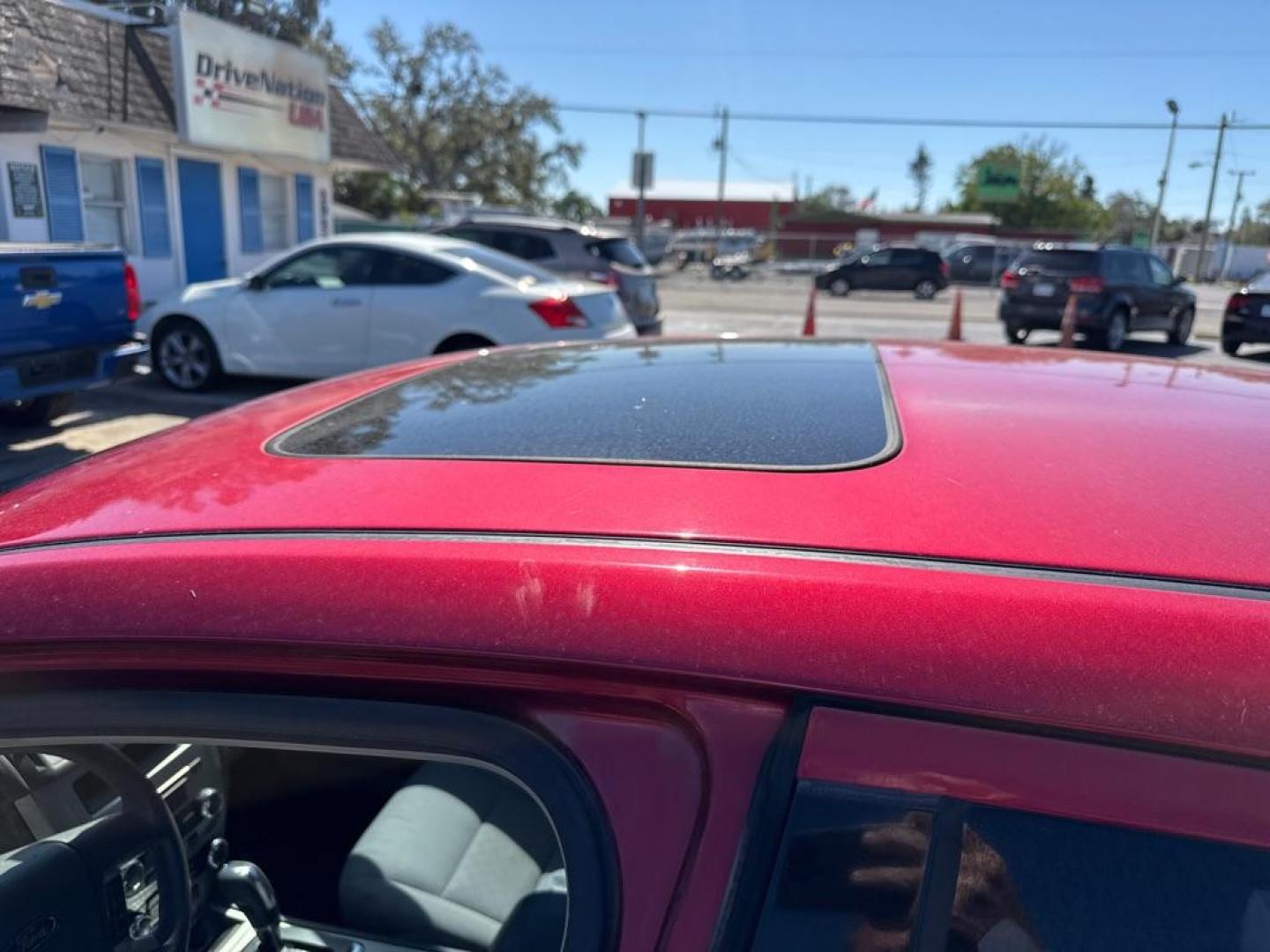 2012 RED FORD FUSION SE (3FAHP0HA6CR) with an 2.5L engine, Automatic transmission, located at 2929 9th St. West, Bradenton, 34205, (941) 242-2810, 27.473591, -82.570679 - Photo#10