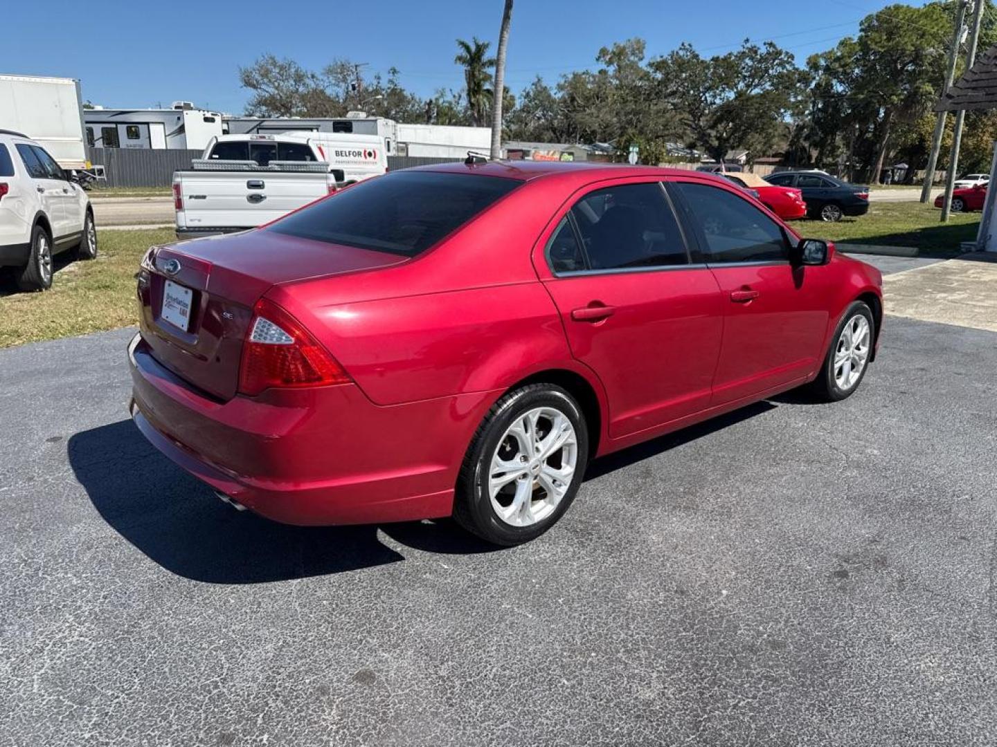 2012 RED FORD FUSION SE (3FAHP0HA6CR) with an 2.5L engine, Automatic transmission, located at 2929 9th St. West, Bradenton, 34205, (941) 242-2810, 27.473591, -82.570679 - Photo#7