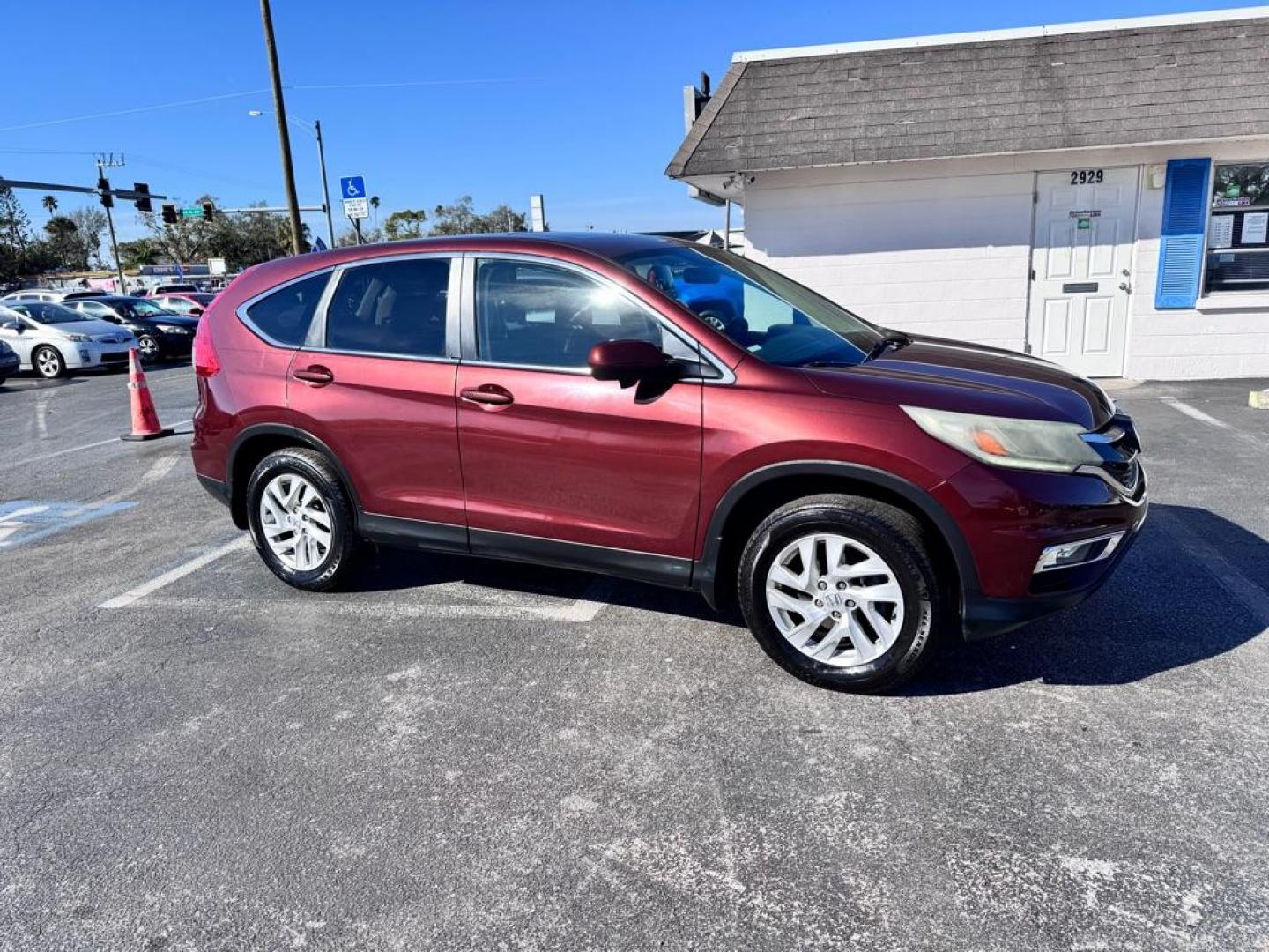 2016 MAROON HONDA CR-V EX (3CZRM3H56GG) with an 2.4L engine, Continuously Variable transmission, located at 2929 9th St. West, Bradenton, 34205, (941) 242-2810, 27.473591, -82.570679 - Photo#0