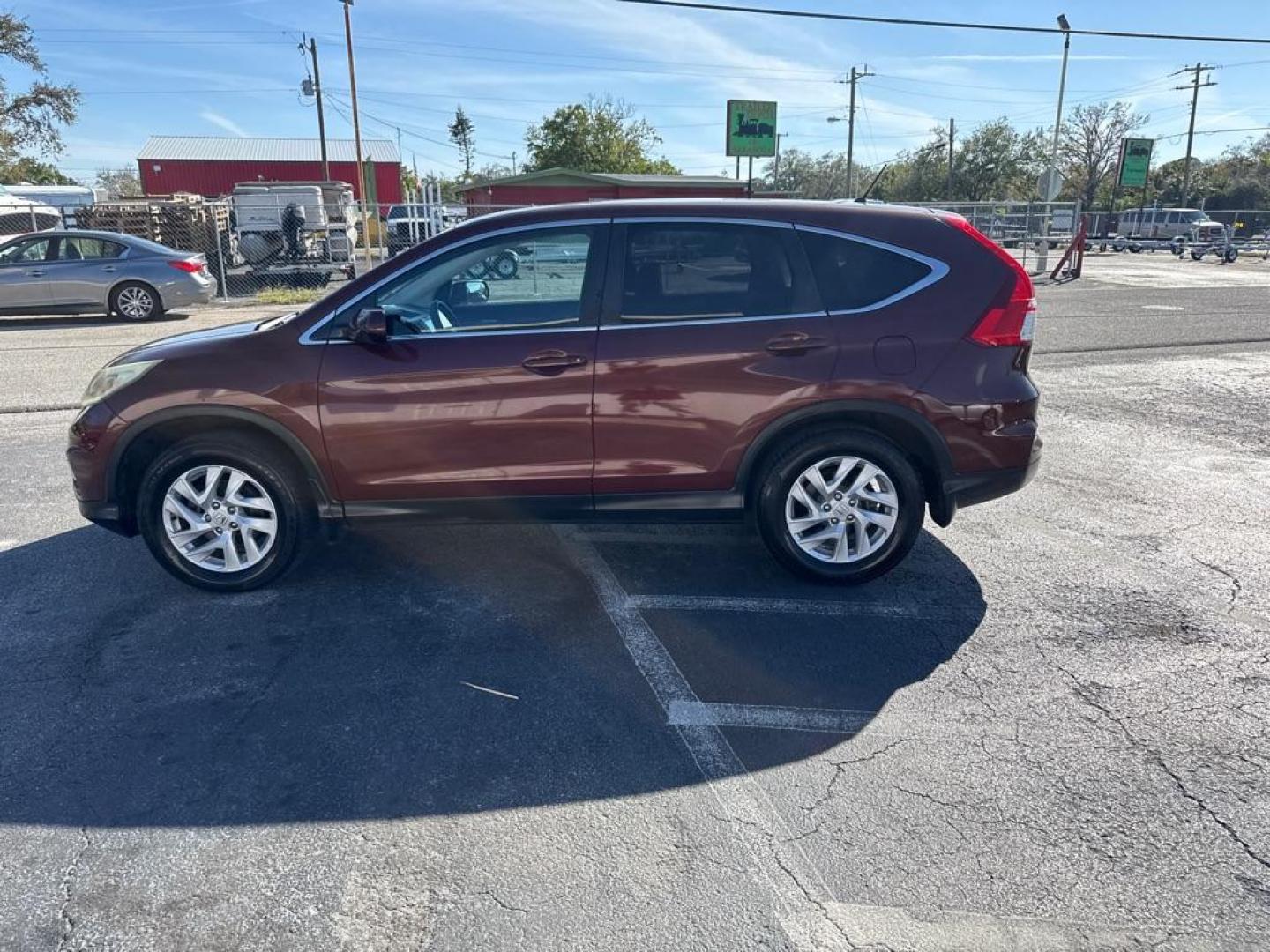 2016 MAROON HONDA CR-V EX (3CZRM3H56GG) with an 2.4L engine, Continuously Variable transmission, located at 2929 9th St. West, Bradenton, 34205, (941) 242-2810, 27.473591, -82.570679 - Photo#4