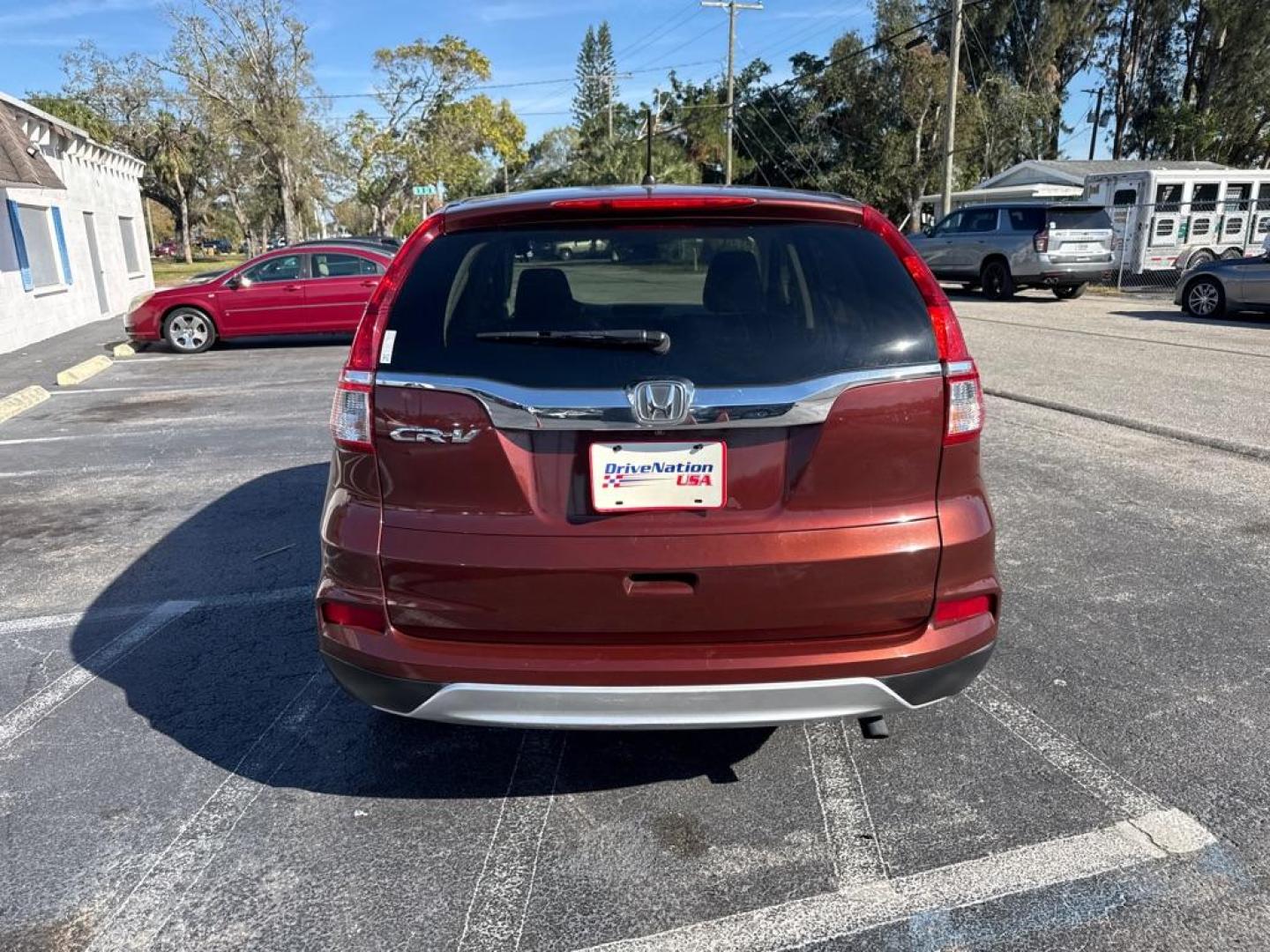 2016 MAROON HONDA CR-V EX (3CZRM3H56GG) with an 2.4L engine, Continuously Variable transmission, located at 2929 9th St. West, Bradenton, 34205, (941) 242-2810, 27.473591, -82.570679 - Photo#6