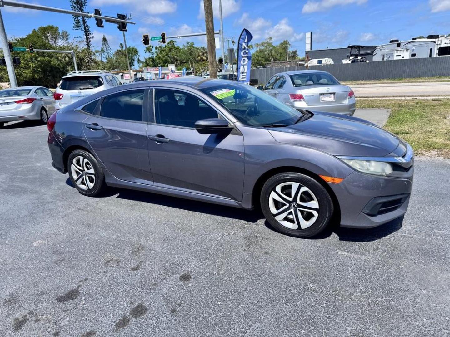 2016 GRAY HONDA CIVIC LX (19XFC2E53GE) with an 2.0L engine, 6-Speed Manual transmission, located at 2929 9th St. West, Bradenton, 34205, (941) 242-2810, 27.473591, -82.570679 - Thanks for inquring into DriveNation USA! All vehicles listed can be viewed at www.drivenationusa.com for vehicle history reports and additonal info. We cannot quote any terms such as down payments or monthly payments without an application. You can apply directly at www.drivenationusa.com or by con - Photo#0