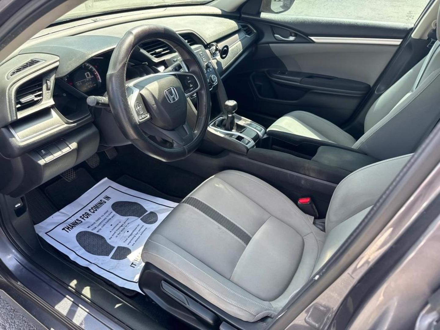 2016 GRAY HONDA CIVIC LX (19XFC2E53GE) with an 2.0L engine, 6-Speed Manual transmission, located at 2929 9th St. West, Bradenton, 34205, (941) 242-2810, 27.473591, -82.570679 - Thanks for inquring into DriveNation USA! All vehicles listed can be viewed at www.drivenationusa.com for vehicle history reports and additonal info. We cannot quote any terms such as down payments or monthly payments without an application. You can apply directly at www.drivenationusa.com or by con - Photo#10