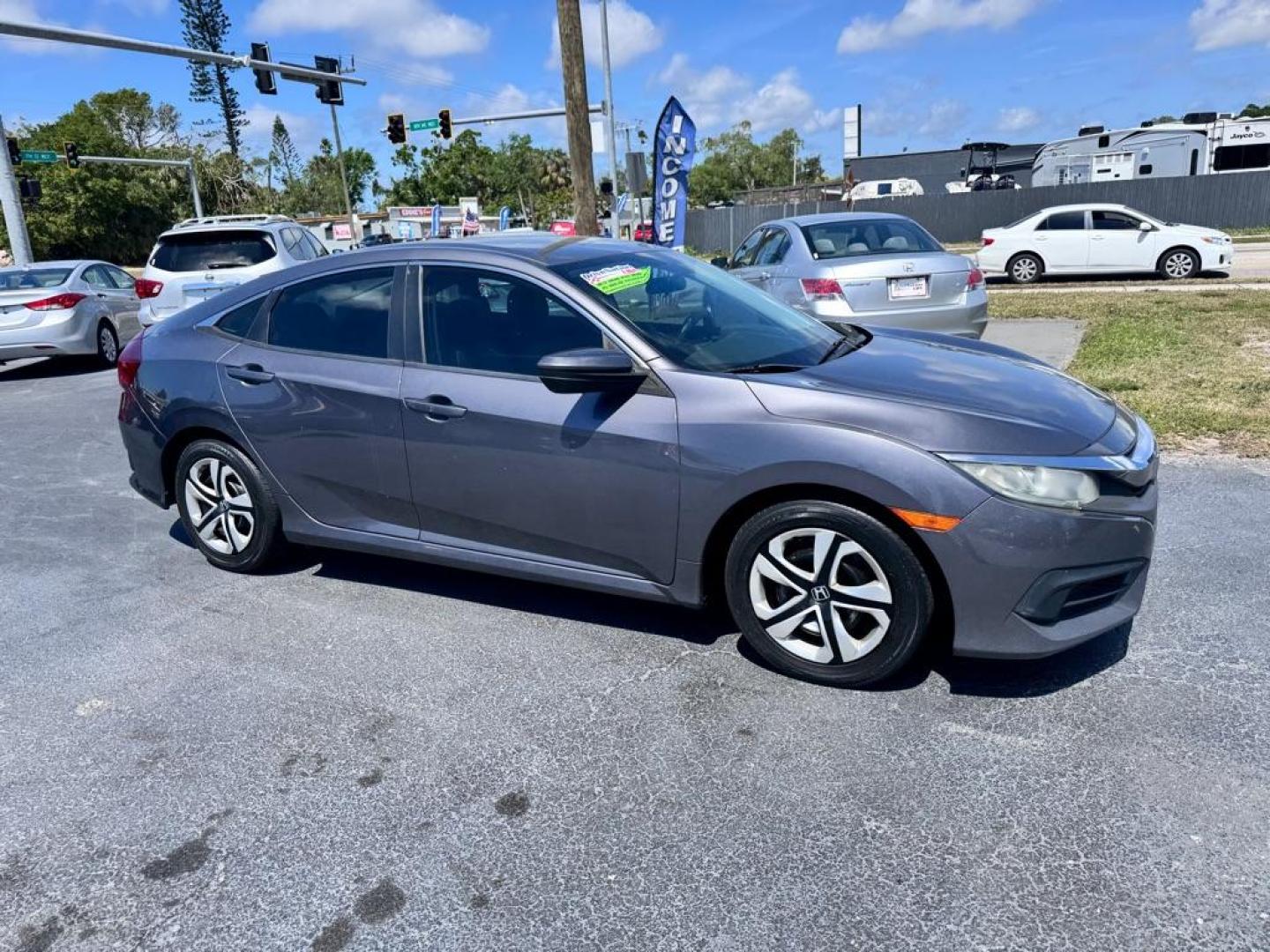 2016 GRAY HONDA CIVIC LX (19XFC2E53GE) with an 2.0L engine, 6-Speed Manual transmission, located at 2929 9th St. West, Bradenton, 34205, (941) 242-2810, 27.473591, -82.570679 - Thanks for inquring into DriveNation USA! All vehicles listed can be viewed at www.drivenationusa.com for vehicle history reports and additonal info. We cannot quote any terms such as down payments or monthly payments without an application. You can apply directly at www.drivenationusa.com or by con - Photo#1