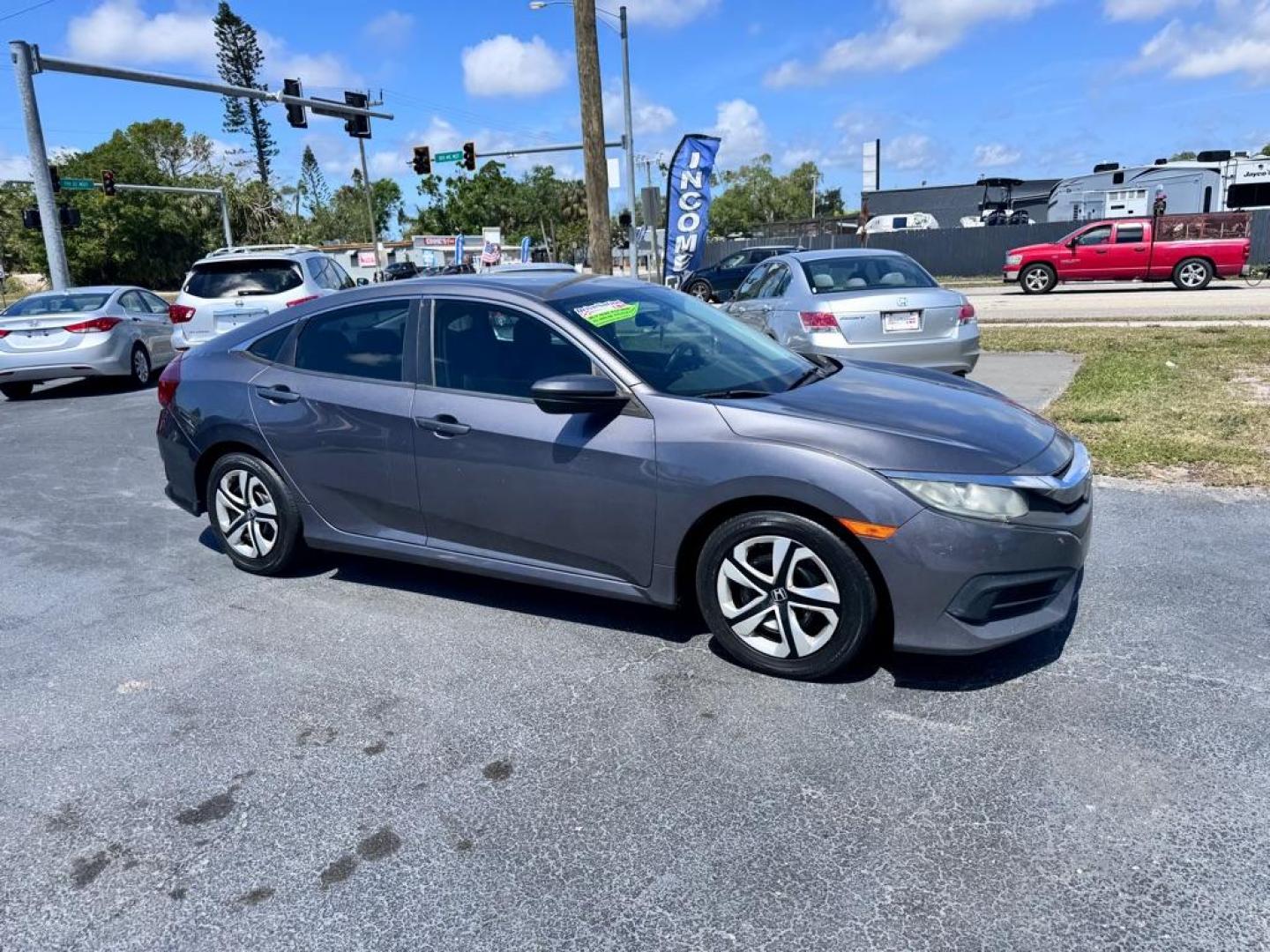 2016 GRAY HONDA CIVIC LX (19XFC2E53GE) with an 2.0L engine, 6-Speed Manual transmission, located at 2929 9th St. West, Bradenton, 34205, (941) 242-2810, 27.473591, -82.570679 - Thanks for inquring into DriveNation USA! All vehicles listed can be viewed at www.drivenationusa.com for vehicle history reports and additonal info. We cannot quote any terms such as down payments or monthly payments without an application. You can apply directly at www.drivenationusa.com or by con - Photo#2