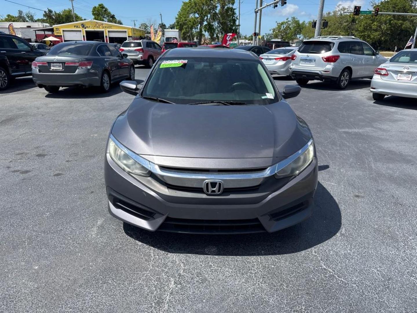 2016 GRAY HONDA CIVIC LX (19XFC2E53GE) with an 2.0L engine, 6-Speed Manual transmission, located at 2929 9th St. West, Bradenton, 34205, (941) 242-2810, 27.473591, -82.570679 - Thanks for inquring into DriveNation USA! All vehicles listed can be viewed at www.drivenationusa.com for vehicle history reports and additonal info. We cannot quote any terms such as down payments or monthly payments without an application. You can apply directly at www.drivenationusa.com or by con - Photo#3