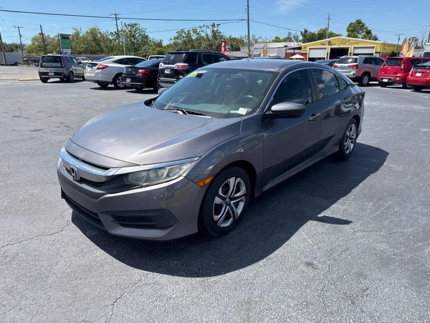 2016 GRAY HONDA CIVIC LX (19XFC2E53GE) with an 2.0L engine, 6-Speed Manual transmission, located at 2929 9th St. West, Bradenton, 34205, (941) 242-2810, 27.473591, -82.570679 - Thanks for inquring into DriveNation USA! All vehicles listed can be viewed at www.drivenationusa.com for vehicle history reports and additonal info. We cannot quote any terms such as down payments or monthly payments without an application. You can apply directly at www.drivenationusa.com or by con - Photo#4