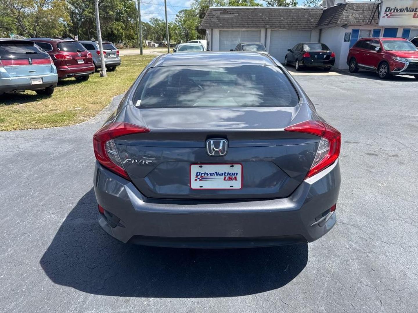 2016 GRAY HONDA CIVIC LX (19XFC2E53GE) with an 2.0L engine, 6-Speed Manual transmission, located at 2929 9th St. West, Bradenton, 34205, (941) 242-2810, 27.473591, -82.570679 - Thanks for inquring into DriveNation USA! All vehicles listed can be viewed at www.drivenationusa.com for vehicle history reports and additonal info. We cannot quote any terms such as down payments or monthly payments without an application. You can apply directly at www.drivenationusa.com or by con - Photo#6