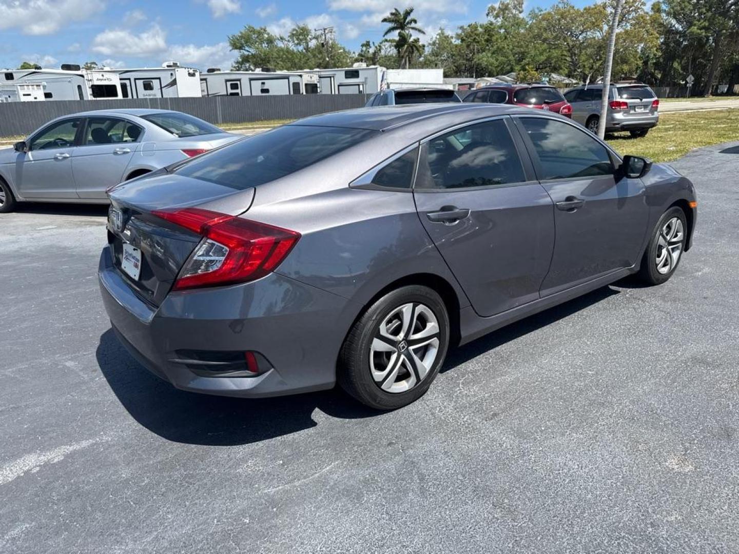 2016 GRAY HONDA CIVIC LX (19XFC2E53GE) with an 2.0L engine, 6-Speed Manual transmission, located at 2929 9th St. West, Bradenton, 34205, (941) 242-2810, 27.473591, -82.570679 - Thanks for inquring into DriveNation USA! All vehicles listed can be viewed at www.drivenationusa.com for vehicle history reports and additonal info. We cannot quote any terms such as down payments or monthly payments without an application. You can apply directly at www.drivenationusa.com or by con - Photo#7