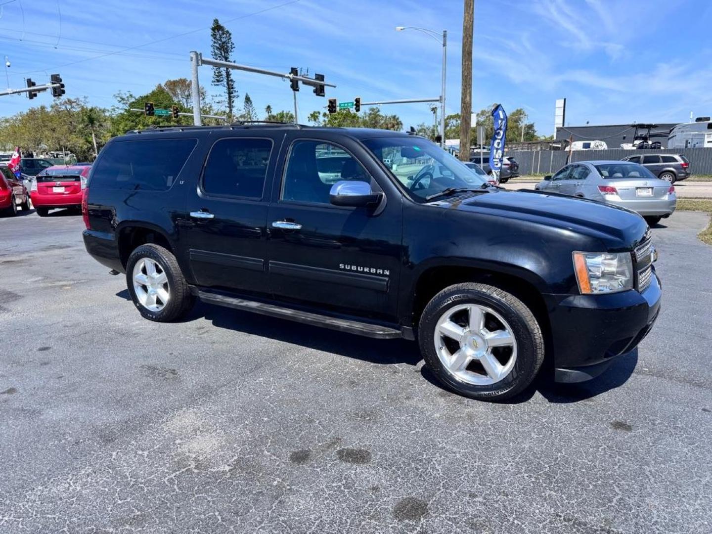 2012 BLACK CHEVROLET SUBURBAN 1500 LT (1GNSCJE09CR) with an 5.3L engine, Automatic transmission, located at 2929 9th St. West, Bradenton, 34205, (941) 242-2810, 27.473591, -82.570679 - Photo#0