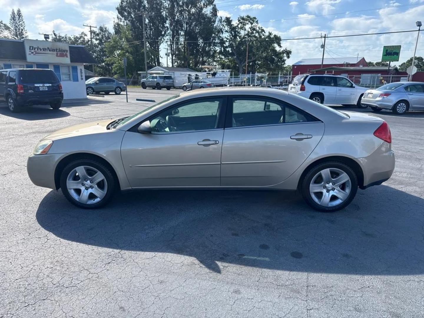 2008 TAN PONTIAC G6 BASE (1G2ZG57B784) with an 2.4L engine, Automatic transmission, located at 2929 9th St. West, Bradenton, 34205, (941) 242-2810, 27.473591, -82.570679 - Thanks for inquring into DriveNation USA! All vehicles listed can be viewed at www.drivenationusa.com for vehicle history reports and additonal info. We cannot quote any terms such as down payments or monthly payments without an application. You can apply directly at www.drivenationusa.com or by con - Photo#4