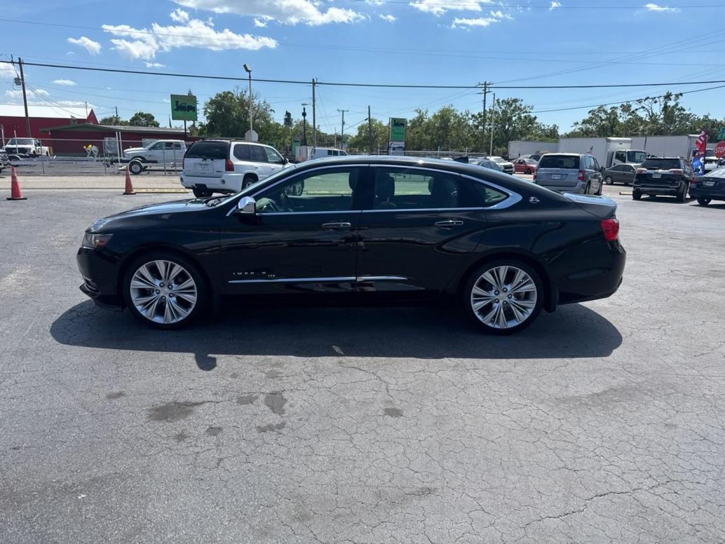2014 BLACK CHEVROLET IMPALA LTZ (2G1155S39E9) with an 3.6L engine, Automatic transmission, located at 2929 9th St. West, Bradenton, 34205, (941) 242-2810, 27.473591, -82.570679 - Thanks for inquring into DriveNation USA! All vehicles listed can be viewed at www.drivenationusa.com for vehicle history reports and additonal info. We cannot quote any terms such as down payments or monthly payments without an application. You can apply directly at www.drivenationusa.com or by con - Photo#4