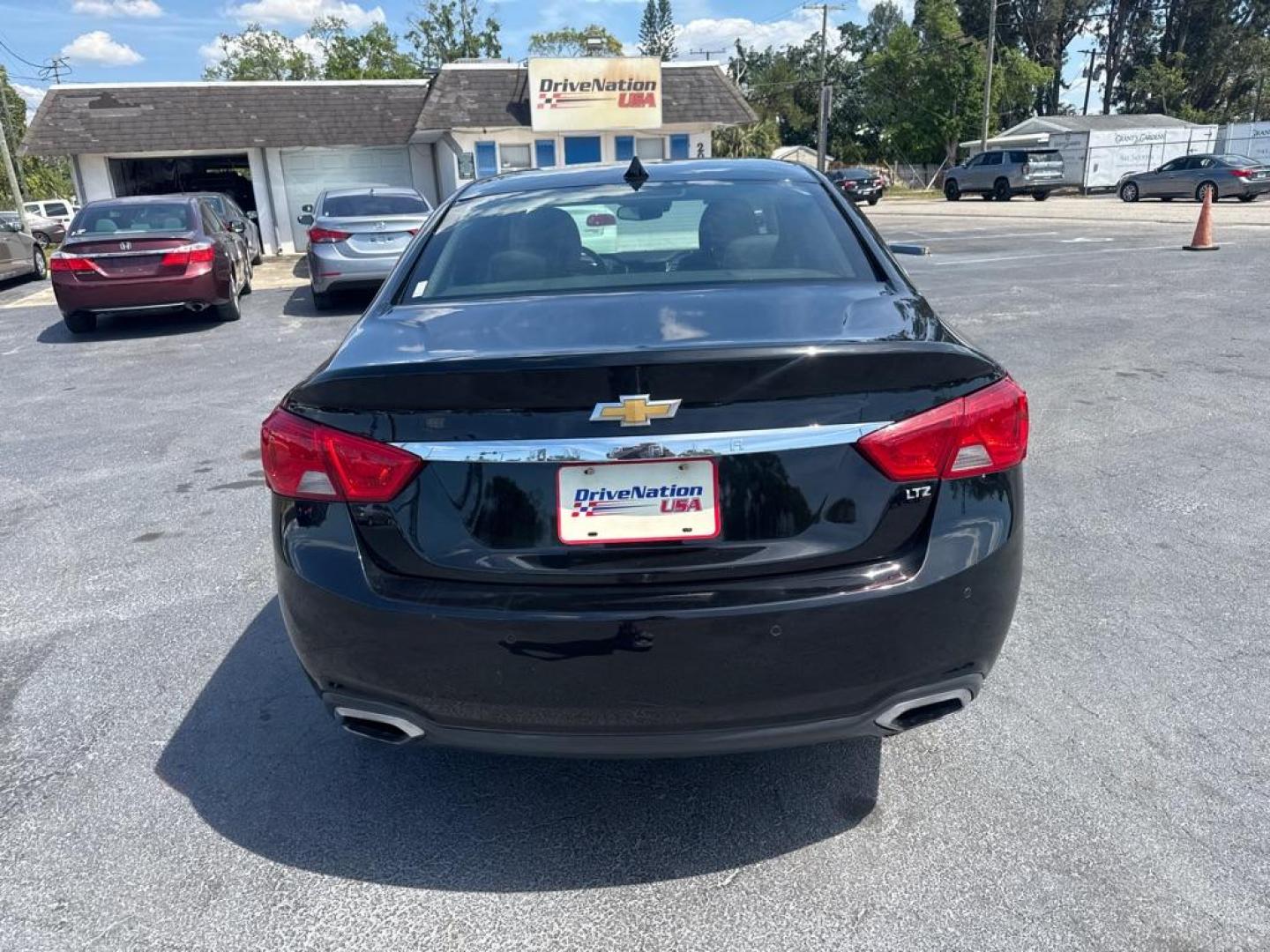 2014 BLACK CHEVROLET IMPALA LTZ (2G1155S39E9) with an 3.6L engine, Automatic transmission, located at 2929 9th St. West, Bradenton, 34205, (941) 242-2810, 27.473591, -82.570679 - Thanks for inquring into DriveNation USA! All vehicles listed can be viewed at www.drivenationusa.com for vehicle history reports and additonal info. We cannot quote any terms such as down payments or monthly payments without an application. You can apply directly at www.drivenationusa.com or by con - Photo#6