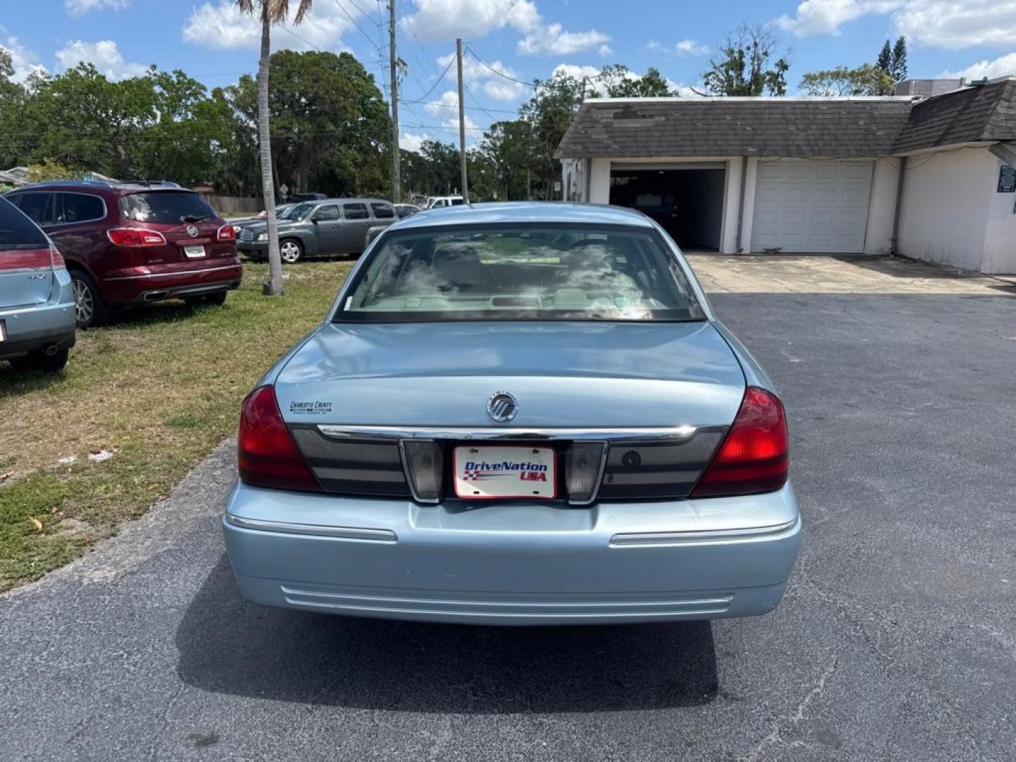 2008 BLUE MERCURY GRAND MARQUIS LS (2MEFM75V68X) with an 4.6L engine, Automatic transmission, located at 2929 9th St. West, Bradenton, 34205, (941) 242-2810, 27.473591, -82.570679 - Thanks for inquring into DriveNation USA! All vehicles listed can be viewed at www.drivenationusa.com for vehicle history reports and additonal info. We cannot quote any terms such as down payments or monthly payments without an application. You can apply directly at www.drivenationusa.com or by con - Photo#5