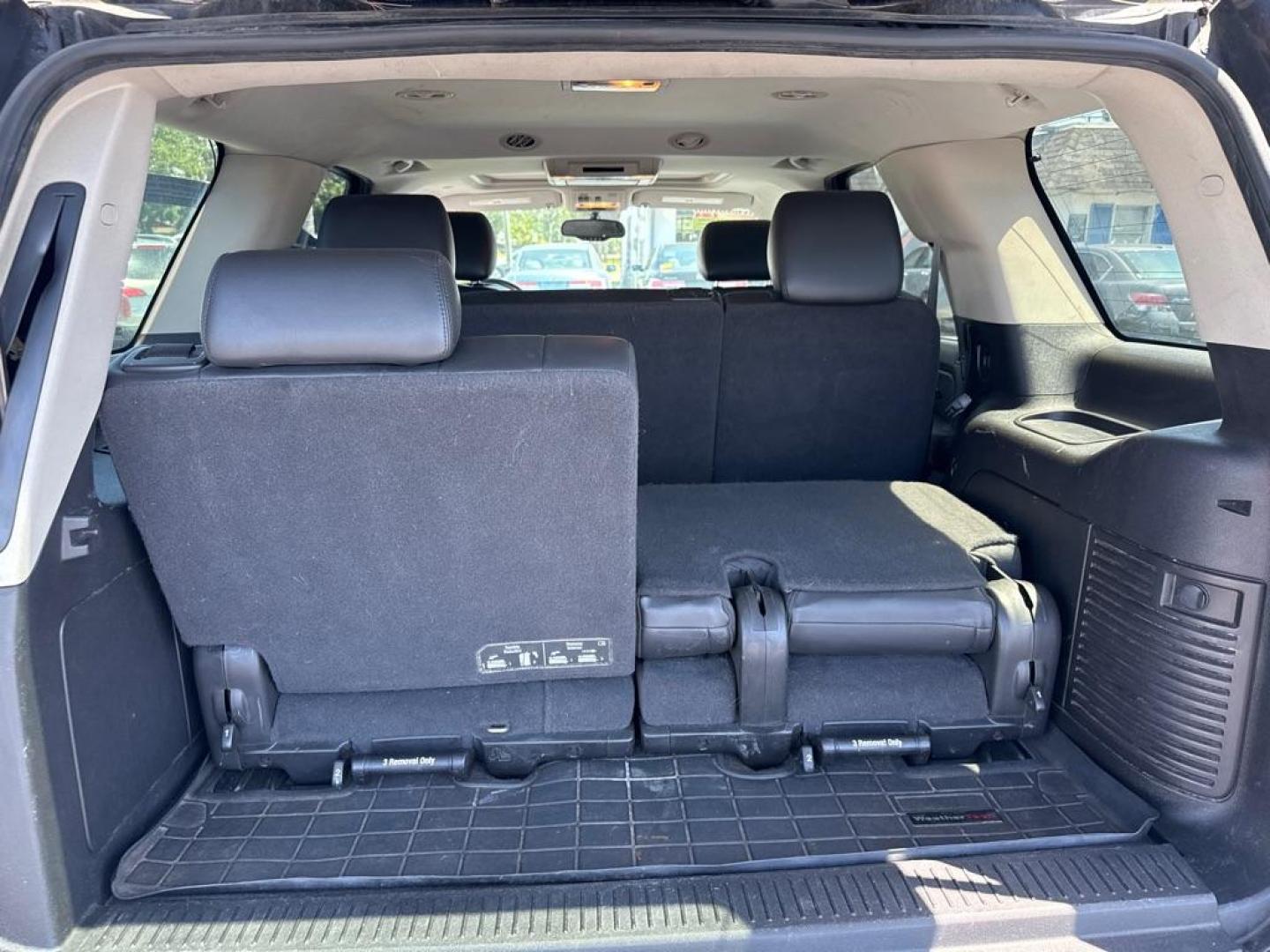 2013 BLACK CHEVROLET TAHOE 1500 LT (1GNSKBE00DR) with an 5.3L engine, Automatic transmission, located at 2929 9th St. West, Bradenton, 34205, (941) 242-2810, 27.473591, -82.570679 - Thanks for inquring into DriveNation USA! All vehicles listed can be viewed at www.drivenationusa.com for vehicle history reports and additonal info. We cannot quote any terms such as down payments or monthly payments without an application. You can apply directly at www.drivenationusa.com or by con - Photo#11