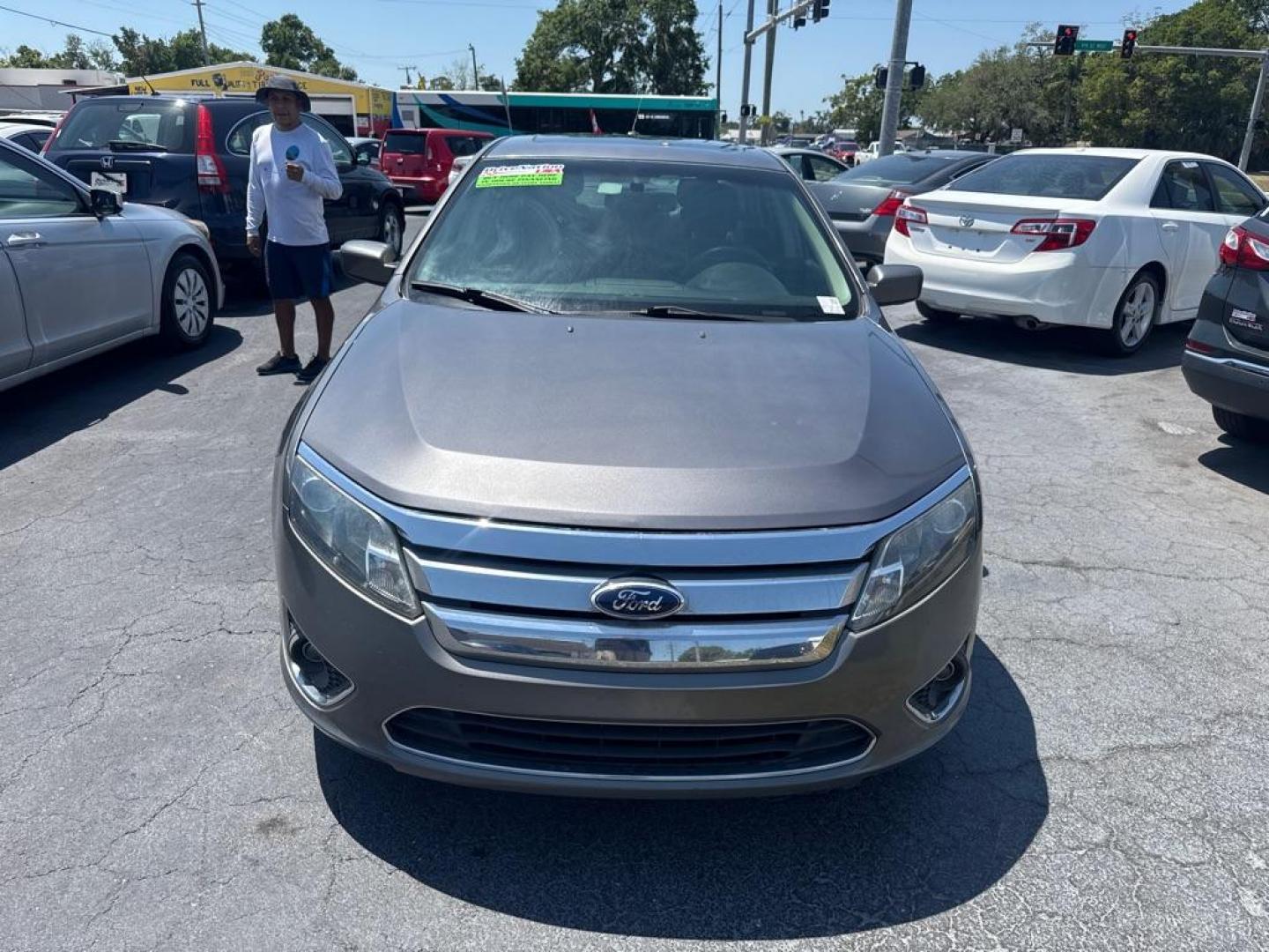 2012 GRAY FORD FUSION SE (3FAHP0HA3CR) with an 2.5L engine, Automatic transmission, located at 2929 9th St. West, Bradenton, 34205, (941) 242-2810, 27.473591, -82.570679 - Thanks for inquring into DriveNation USA! All vehicles listed can be viewed at www.drivenationusa.com for vehicle history reports and additonal info. We cannot quote any terms such as down payments or monthly payments without an application. You can apply directly at www.drivenationusa.com or by con - Photo#1