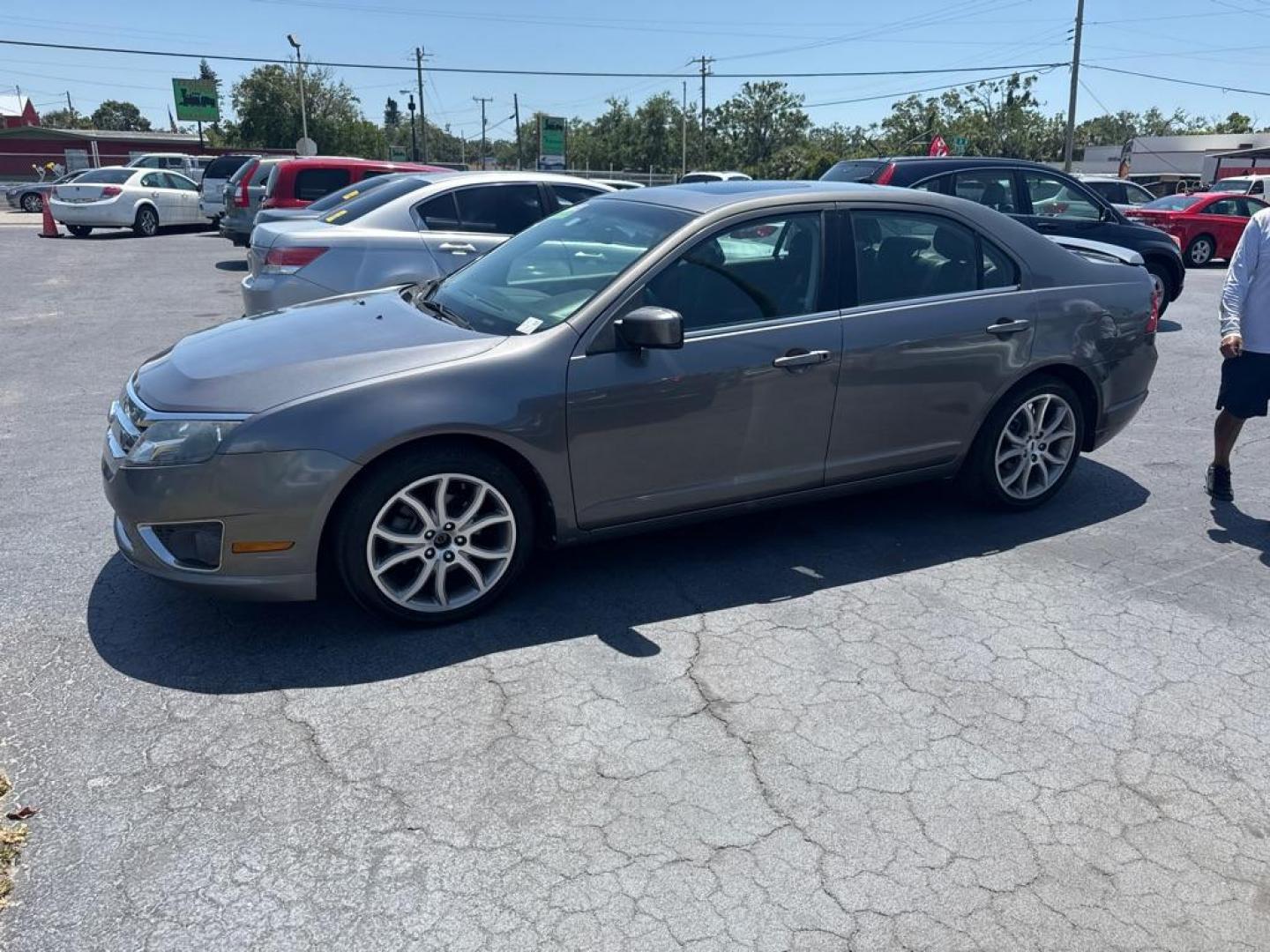 2012 GRAY FORD FUSION SE (3FAHP0HA3CR) with an 2.5L engine, Automatic transmission, located at 2929 9th St. West, Bradenton, 34205, (941) 242-2810, 27.473591, -82.570679 - Thanks for inquring into DriveNation USA! All vehicles listed can be viewed at www.drivenationusa.com for vehicle history reports and additonal info. We cannot quote any terms such as down payments or monthly payments without an application. You can apply directly at www.drivenationusa.com or by con - Photo#2