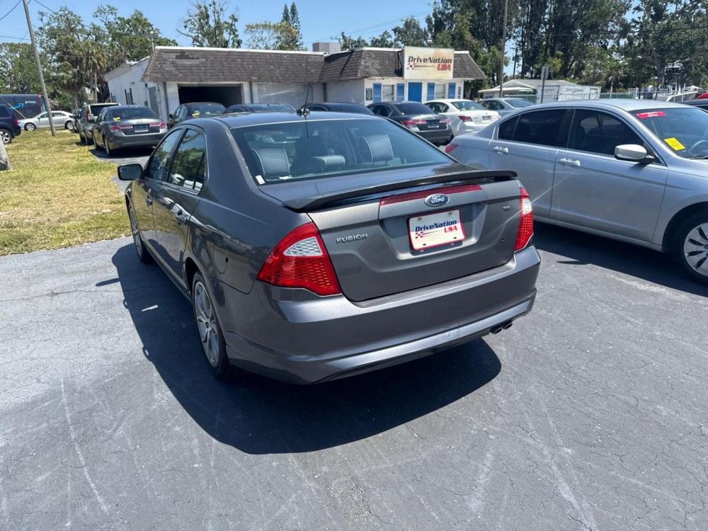 2012 GRAY FORD FUSION SE (3FAHP0HA3CR) with an 2.5L engine, Automatic transmission, located at 2929 9th St. West, Bradenton, 34205, (941) 242-2810, 27.473591, -82.570679 - Thanks for inquring into DriveNation USA! All vehicles listed can be viewed at www.drivenationusa.com for vehicle history reports and additonal info. We cannot quote any terms such as down payments or monthly payments without an application. You can apply directly at www.drivenationusa.com or by con - Photo#3