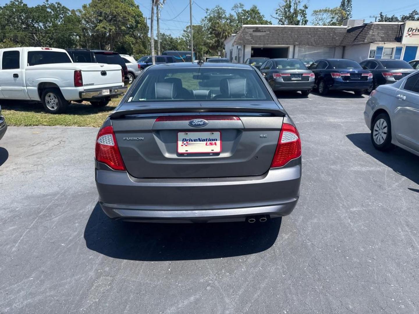 2012 GRAY FORD FUSION SE (3FAHP0HA3CR) with an 2.5L engine, Automatic transmission, located at 2929 9th St. West, Bradenton, 34205, (941) 242-2810, 27.473591, -82.570679 - Thanks for inquring into DriveNation USA! All vehicles listed can be viewed at www.drivenationusa.com for vehicle history reports and additonal info. We cannot quote any terms such as down payments or monthly payments without an application. You can apply directly at www.drivenationusa.com or by con - Photo#4