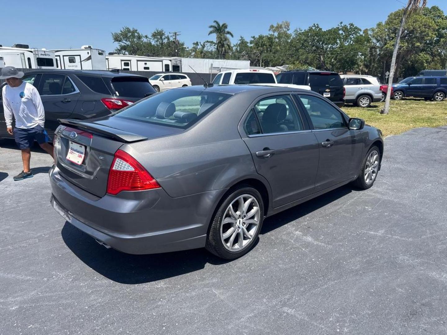 2012 GRAY FORD FUSION SE (3FAHP0HA3CR) with an 2.5L engine, Automatic transmission, located at 2929 9th St. West, Bradenton, 34205, (941) 242-2810, 27.473591, -82.570679 - Thanks for inquring into DriveNation USA! All vehicles listed can be viewed at www.drivenationusa.com for vehicle history reports and additonal info. We cannot quote any terms such as down payments or monthly payments without an application. You can apply directly at www.drivenationusa.com or by con - Photo#5