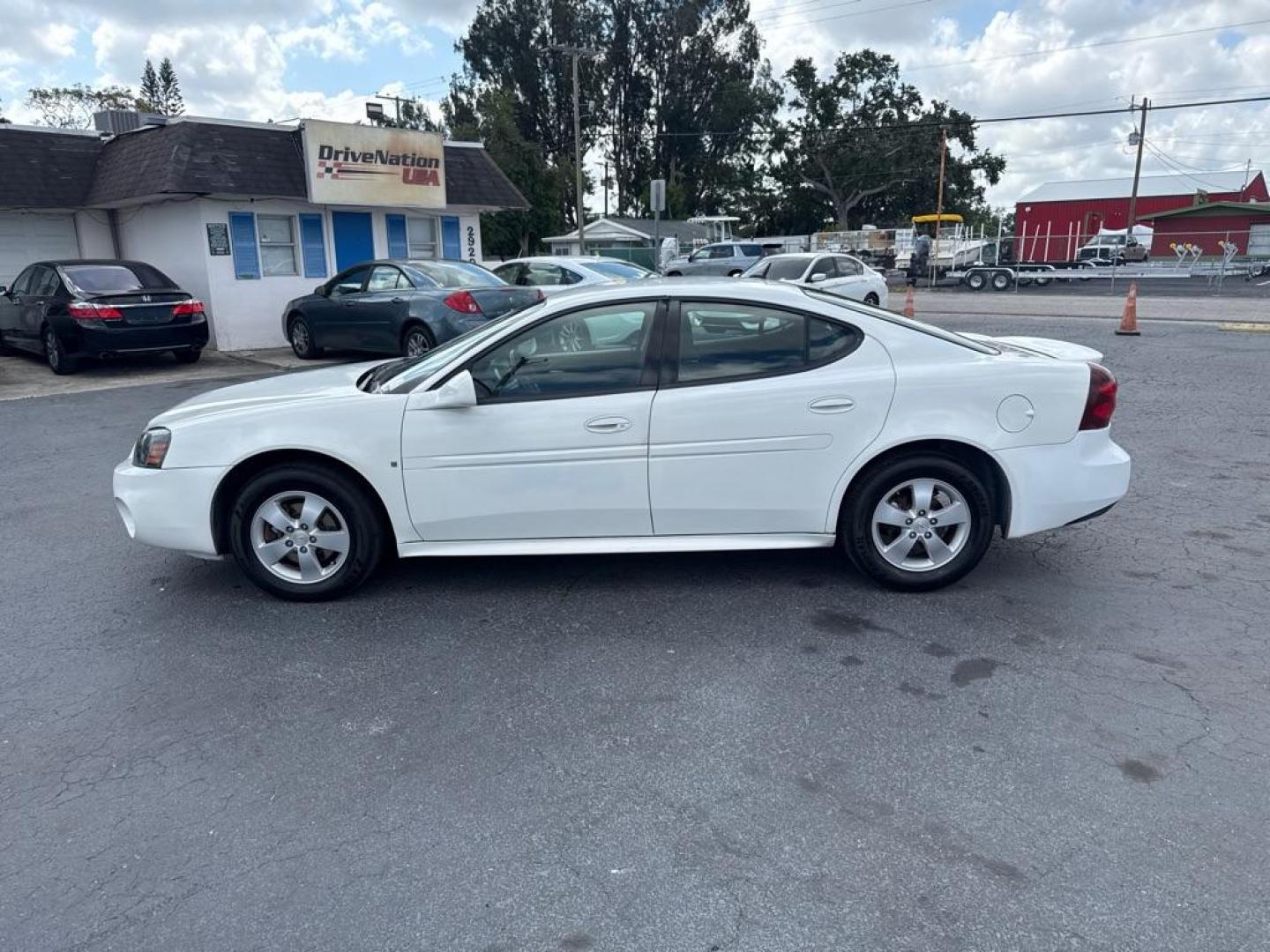 2008 WHITE PONTIAC GRAND PRIX (2G2WP552681) with an 3.8L engine, Automatic transmission, located at 2929 9th St. West, Bradenton, 34205, (941) 242-2810, 27.473591, -82.570679 - Thanks for inquring into DriveNation USA! All vehicles listed can be viewed at www.drivenationusa.com for vehicle history reports and additonal info. We cannot quote any terms such as down payments or monthly payments without an application. You can apply directly at www.drivenationusa.com or by con - Photo#5