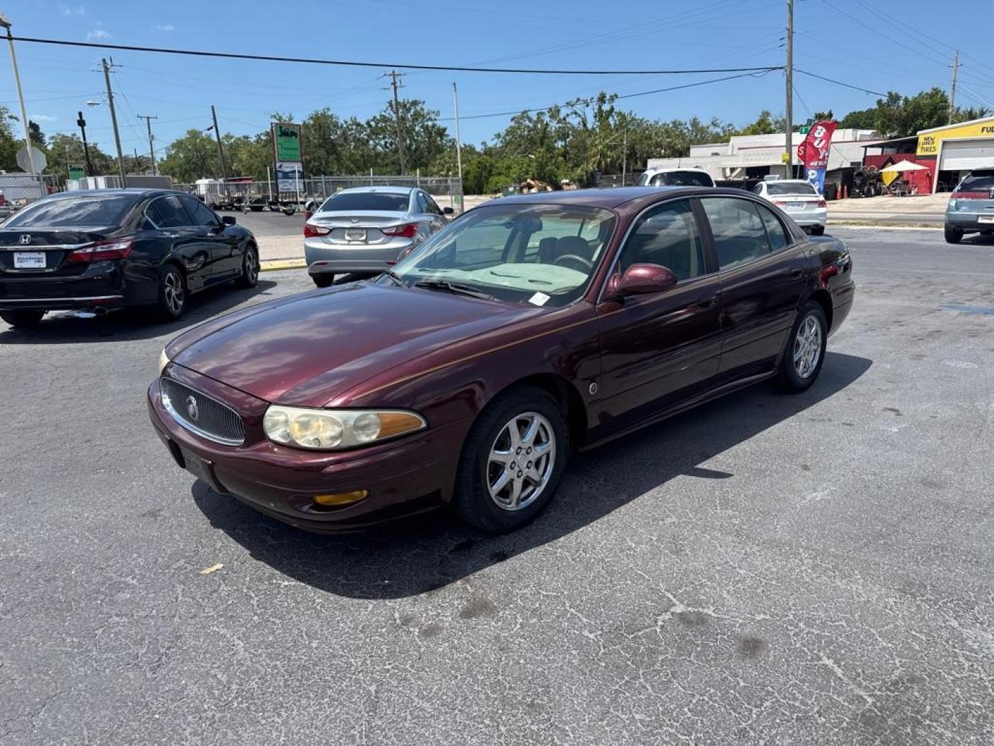 2005 MAROON BUICK LESABRE CUSTOM (1G4HP52K65U) with an 3.8L engine, Automatic transmission, located at 2929 9th St. West, Bradenton, 34205, (941) 242-2810, 27.473591, -82.570679 - Photo#3