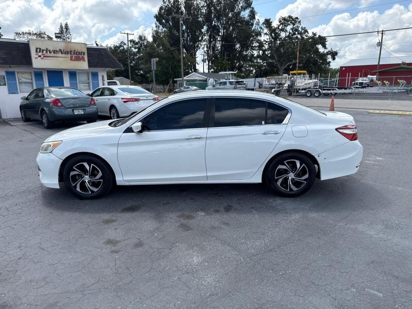 2017 WHITE HONDA ACCORD LX (1HGCR2F3XHA) with an 2.4L engine, Continuously Variable transmission, located at 2929 9th St. West, Bradenton, 34205, (941) 242-2810, 27.473591, -82.570679 - Thanks for inquring into DriveNation USA! All vehicles listed can be viewed at www.drivenationusa.com for vehicle history reports and additonal info. We cannot quote any terms such as down payments or monthly payments without an application. You can apply directly at www.drivenationusa.com or by con - Photo#4
