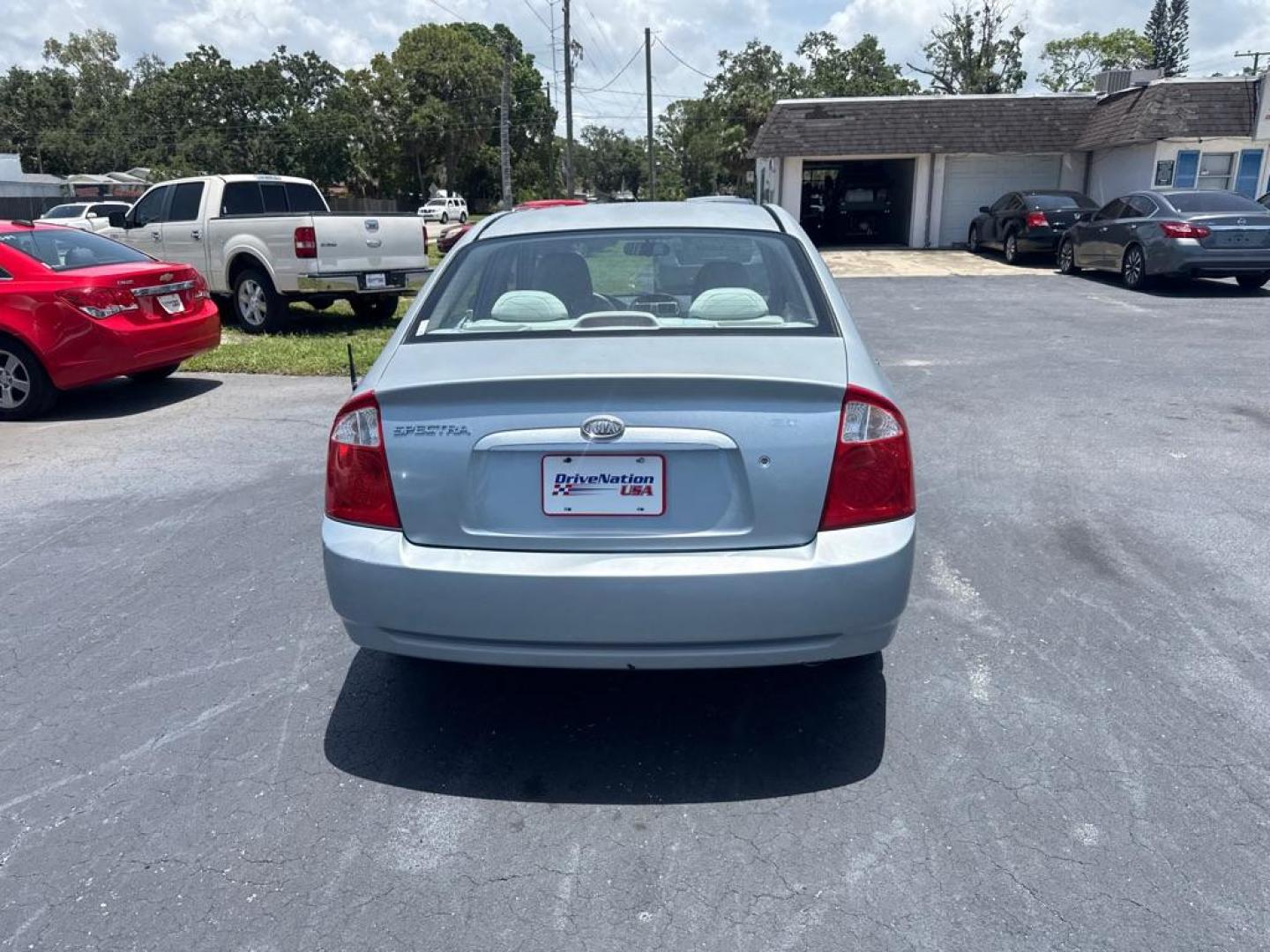2006 SILVER KIA SPECTRA LX (KNAFE121965) with an 2.0L engine, Automatic transmission, located at 2929 9th St. West, Bradenton, 34205, (941) 242-2810, 27.473591, -82.570679 - Thanks for inquring into DriveNation USA! All vehicles listed can be viewed at www.drivenationusa.com for vehicle history reports and additonal info. We cannot quote any terms such as down payments or monthly payments without an application. You can apply directly at www.drivenationusa.com or by con - Photo#5