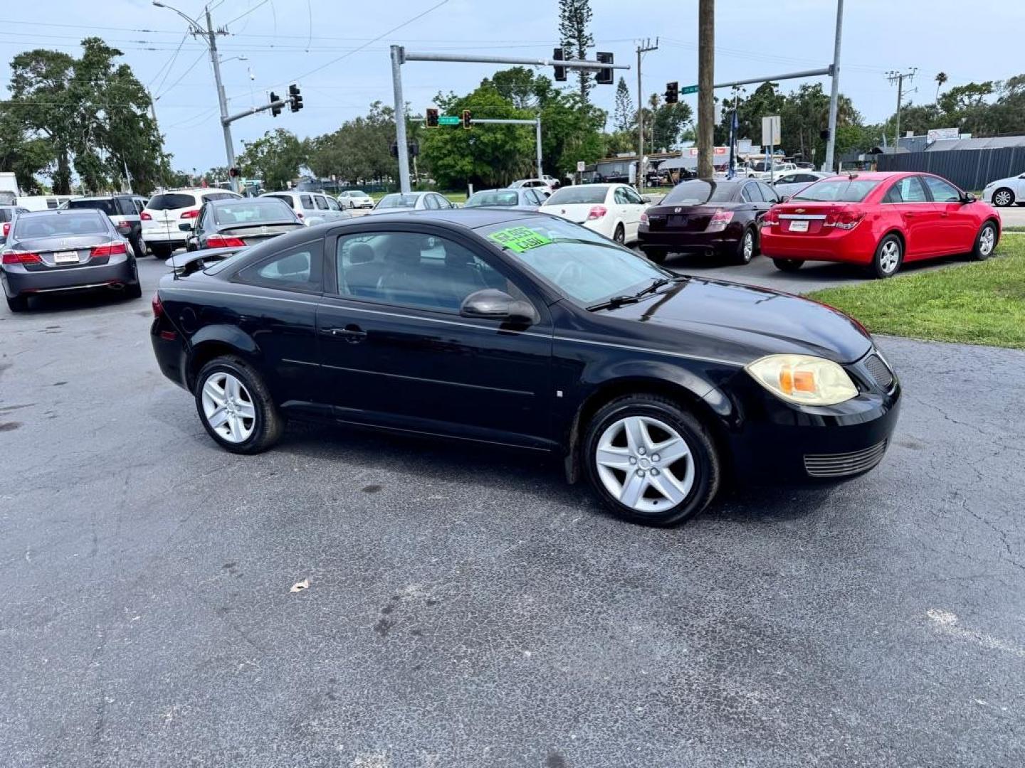 2007 BLACK PONTIAC G5 COUPE (1G2AL15F077) with an 2.2L engine, Automatic transmission, located at 2929 9th St. West, Bradenton, 34205, (941) 242-2810, 27.473591, -82.570679 - Thanks for inquring into DriveNation USA! All vehicles listed can be viewed at www.drivenationusa.com for vehicle history reports and additonal info. We cannot quote any terms such as down payments or monthly payments without an application. You can apply directly at www.drivenationusa.com or by con - Photo#1