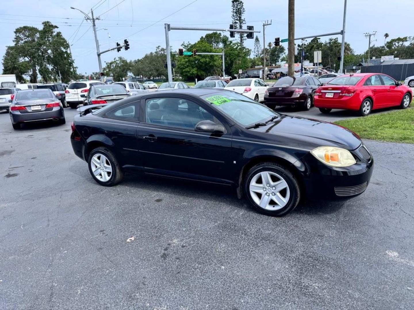 2007 BLACK PONTIAC G5 COUPE (1G2AL15F077) with an 2.2L engine, Automatic transmission, located at 2929 9th St. West, Bradenton, 34205, (941) 242-2810, 27.473591, -82.570679 - Thanks for inquring into DriveNation USA! All vehicles listed can be viewed at www.drivenationusa.com for vehicle history reports and additonal info. We cannot quote any terms such as down payments or monthly payments without an application. You can apply directly at www.drivenationusa.com or by con - Photo#2