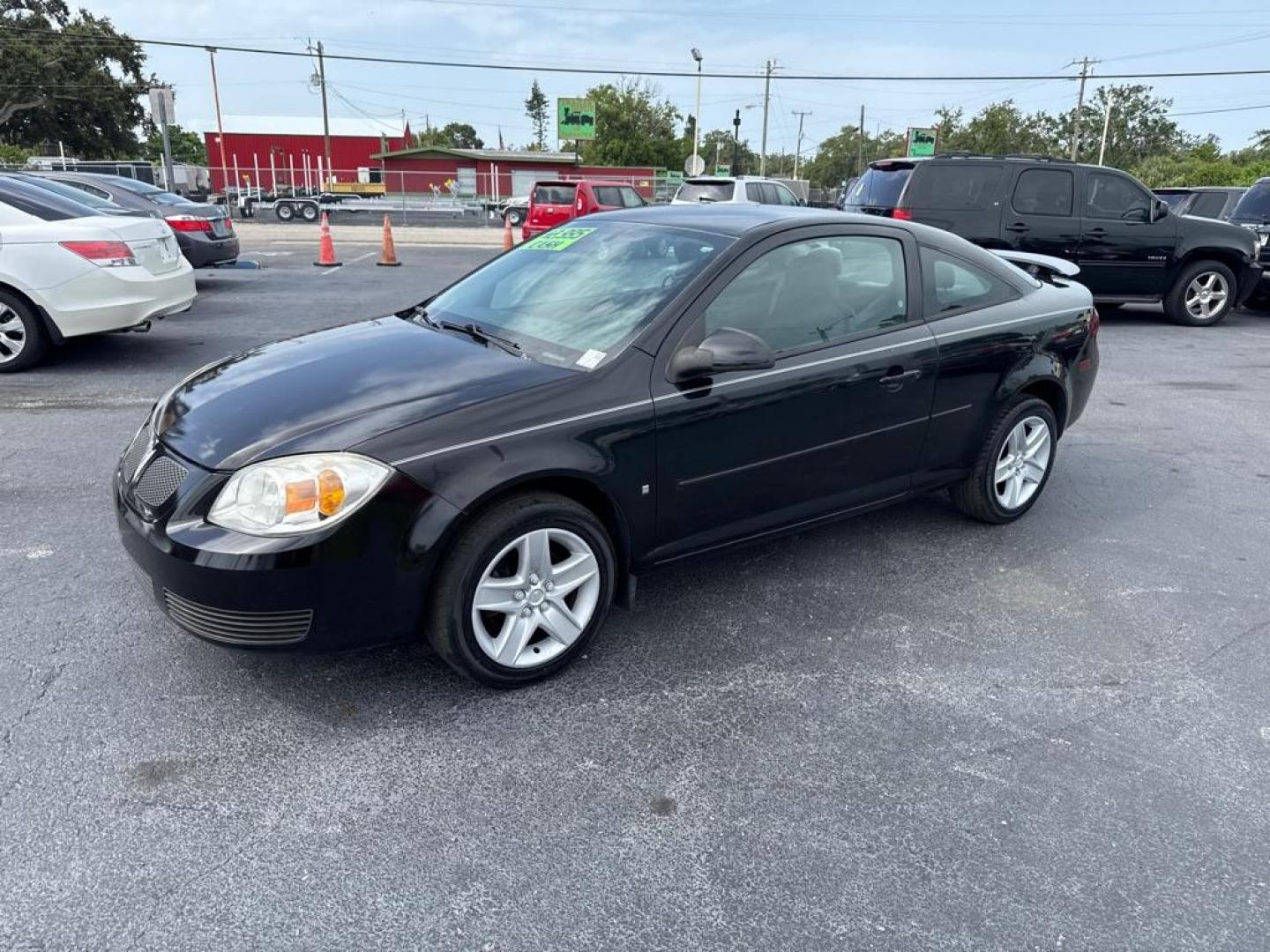 2007 BLACK PONTIAC G5 COUPE (1G2AL15F077) with an 2.2L engine, Automatic transmission, located at 2929 9th St. West, Bradenton, 34205, (941) 242-2810, 27.473591, -82.570679 - Thanks for inquring into DriveNation USA! All vehicles listed can be viewed at www.drivenationusa.com for vehicle history reports and additonal info. We cannot quote any terms such as down payments or monthly payments without an application. You can apply directly at www.drivenationusa.com or by con - Photo#4