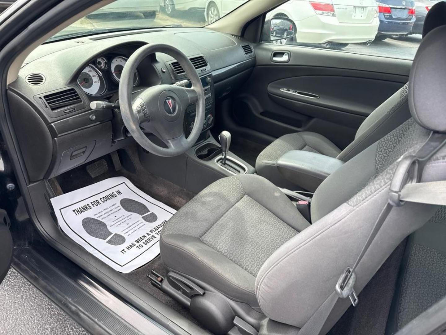 2007 BLACK PONTIAC G5 COUPE (1G2AL15F077) with an 2.2L engine, Automatic transmission, located at 2929 9th St. West, Bradenton, 34205, (941) 242-2810, 27.473591, -82.570679 - Thanks for inquring into DriveNation USA! All vehicles listed can be viewed at www.drivenationusa.com for vehicle history reports and additonal info. We cannot quote any terms such as down payments or monthly payments without an application. You can apply directly at www.drivenationusa.com or by con - Photo#9