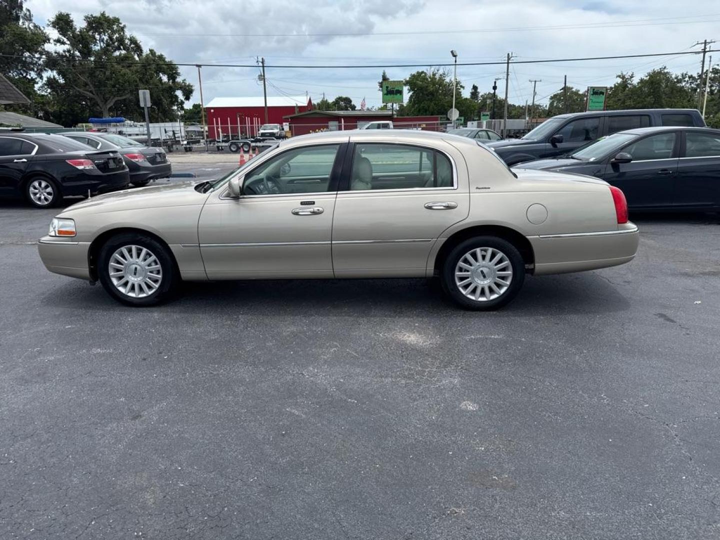 2004 TAN LINCOLN TOWN CAR EXECUTIVE (1LNHM81W84Y) with an 4.6L engine, Automatic transmission, located at 2929 9th St. West, Bradenton, 34205, (941) 242-2810, 27.473591, -82.570679 - Thanks for inquring into DriveNation USA! All vehicles listed can be viewed at www.drivenationusa.com for vehicle history reports and additonal info. We cannot quote any terms such as down payments or monthly payments without an application. You can apply directly at www.drivenationusa.com or by con - Photo#5