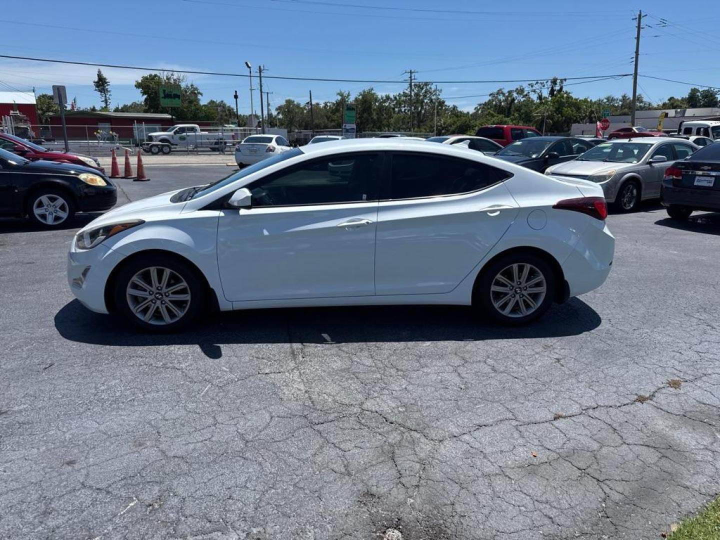 2015 WHITE HYUNDAI ELANTRA SE (5NPDH4AE8FH) with an 1.8L engine, Automatic transmission, located at 2929 9th St. West, Bradenton, 34205, (941) 242-2810, 27.473591, -82.570679 - Thanks for inquring into DriveNation USA! All vehicles listed can be viewed at www.drivenationusa.com for vehicle history reports and additonal info. We cannot quote any terms such as down payments or monthly payments without an application. You can apply directly at www.drivenationusa.com or by con - Photo#4