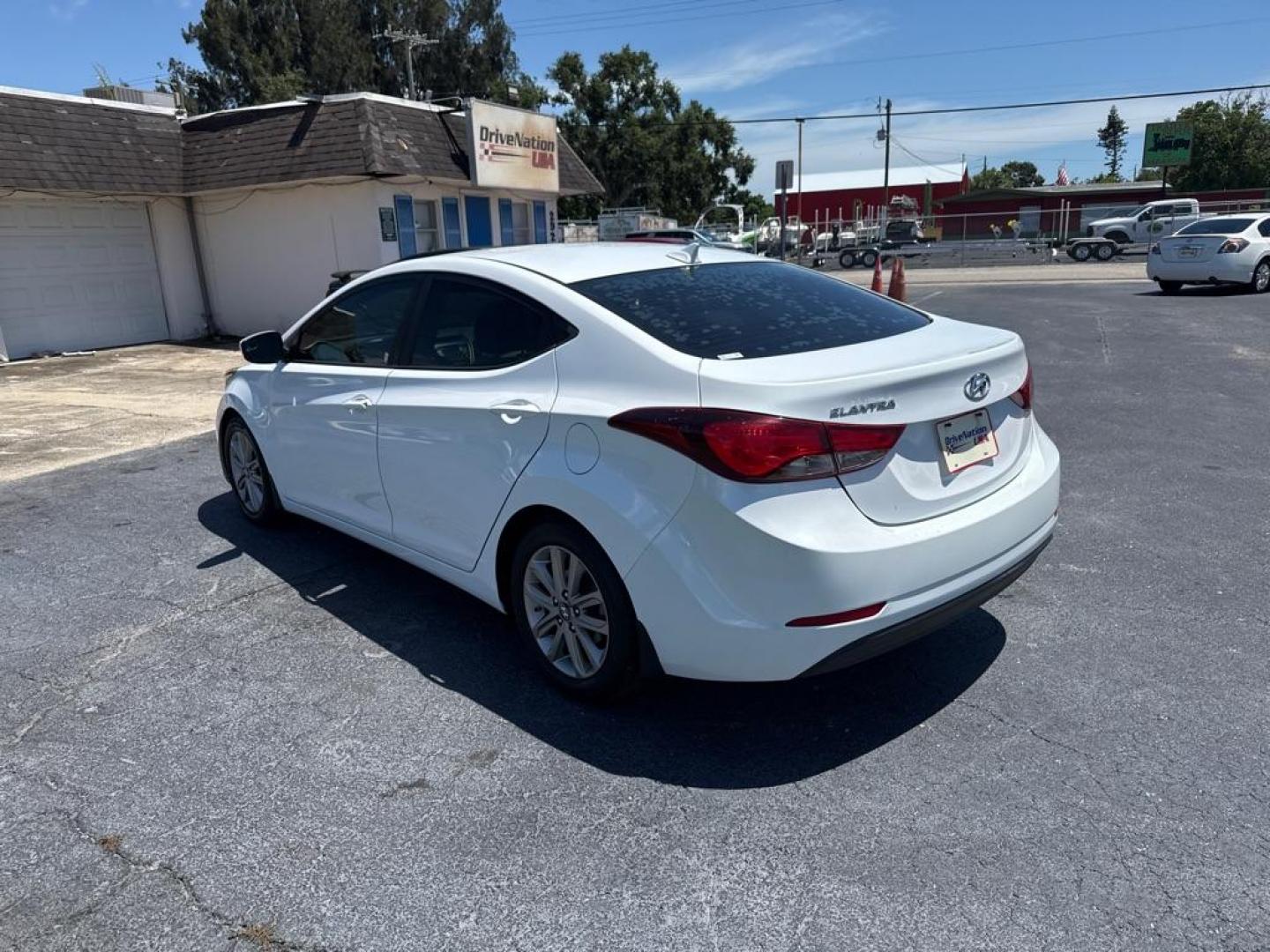 2015 WHITE HYUNDAI ELANTRA SE (5NPDH4AE8FH) with an 1.8L engine, Automatic transmission, located at 2929 9th St. West, Bradenton, 34205, (941) 242-2810, 27.473591, -82.570679 - Thanks for inquring into DriveNation USA! All vehicles listed can be viewed at www.drivenationusa.com for vehicle history reports and additonal info. We cannot quote any terms such as down payments or monthly payments without an application. You can apply directly at www.drivenationusa.com or by con - Photo#5