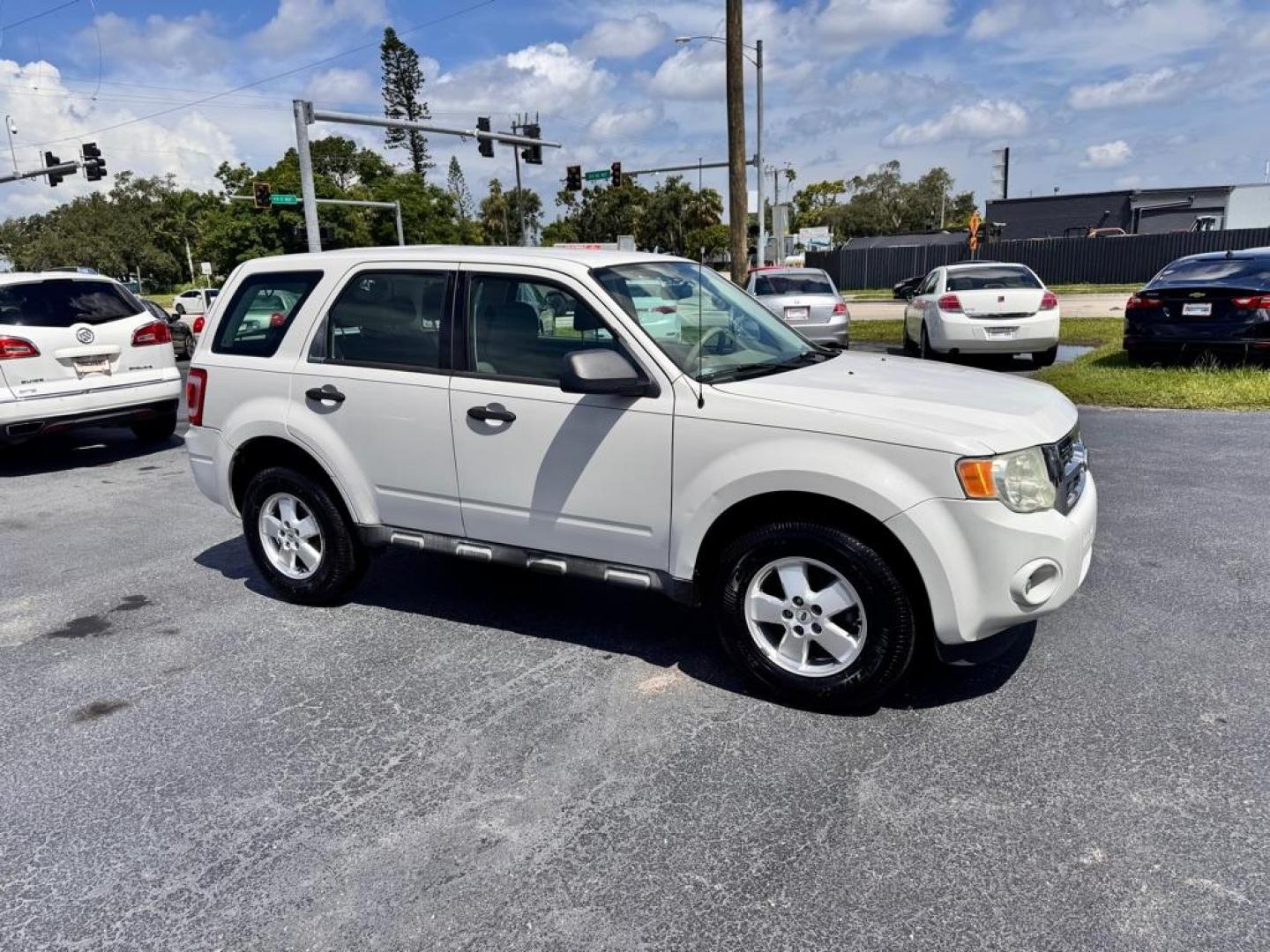 2010 WHITE FORD ESCAPE XLS (1FMCU0C77AK) with an 2.5L engine, Automatic transmission, located at 2929 9th St. West, Bradenton, 34205, (941) 242-2810, 27.473591, -82.570679 - Thanks for inquring into DriveNation USA! All vehicles listed can be viewed at www.drivenationusa.com for vehicle history reports and additonal info. We cannot quote any terms such as down payments or monthly payments without an application. You can apply directly at www.drivenationusa.com or by con - Photo#2