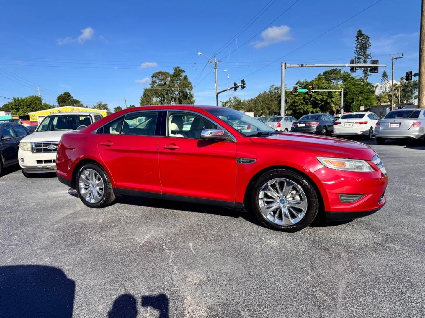 2011 RED FORD TAURUS LIMITED (1FAHP2FW1BG) with an 3.5L engine, Automatic transmission, located at 2929 9th St. West, Bradenton, 34205, (941) 242-2810, 27.473591, -82.570679 - Thanks for inquring into DriveNation USA! All vehicles listed can be viewed at www.drivenationusa.com for vehicle history reports and additonal info. We cannot quote any terms such as down payments or monthly payments without an application. You can apply directly at www.drivenationusa.com or by con - Photo#0