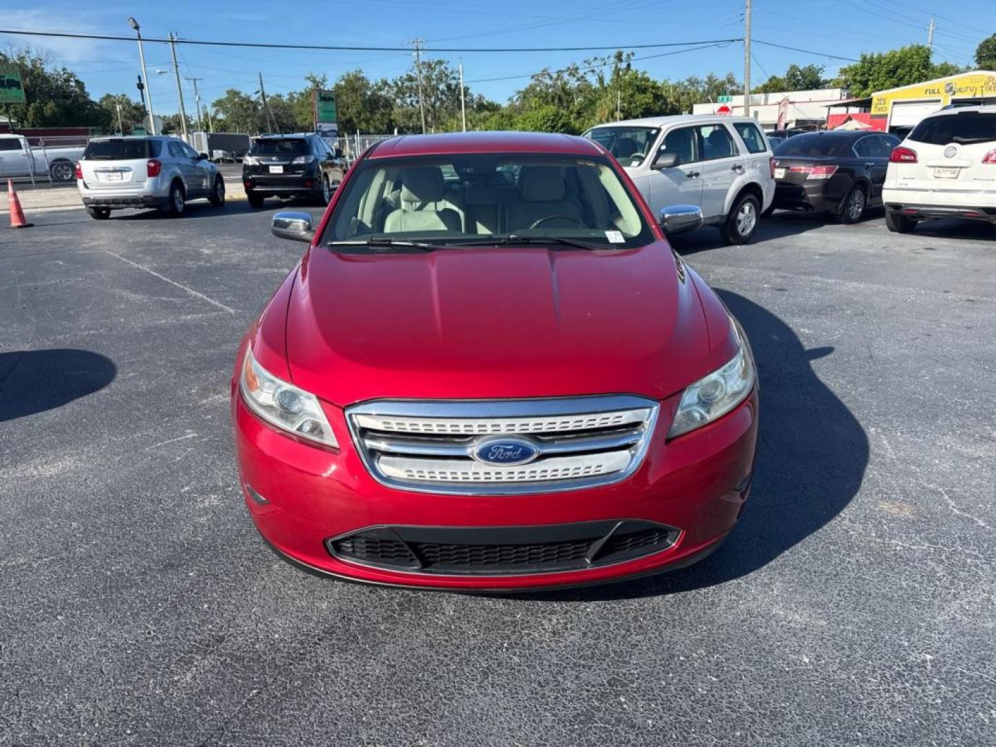 2011 RED FORD TAURUS LIMITED (1FAHP2FW1BG) with an 3.5L engine, Automatic transmission, located at 2929 9th St. West, Bradenton, 34205, (941) 242-2810, 27.473591, -82.570679 - Thanks for inquring into DriveNation USA! All vehicles listed can be viewed at www.drivenationusa.com for vehicle history reports and additonal info. We cannot quote any terms such as down payments or monthly payments without an application. You can apply directly at www.drivenationusa.com or by con - Photo#4