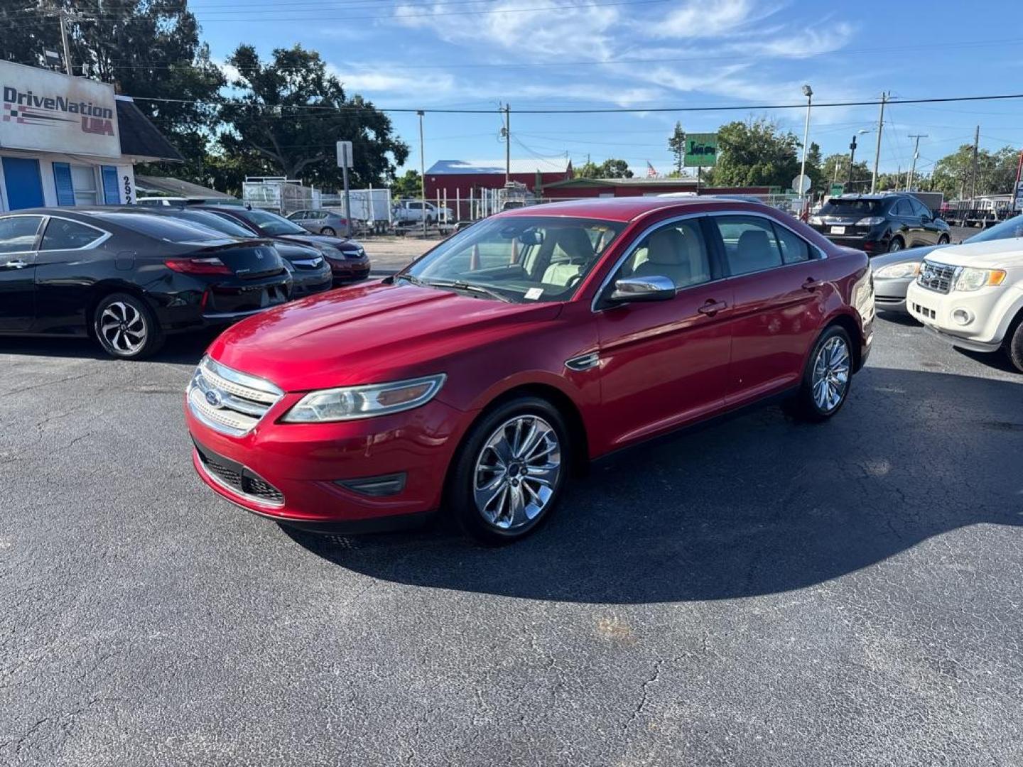2011 RED FORD TAURUS LIMITED (1FAHP2FW1BG) with an 3.5L engine, Automatic transmission, located at 2929 9th St. West, Bradenton, 34205, (941) 242-2810, 27.473591, -82.570679 - Thanks for inquring into DriveNation USA! All vehicles listed can be viewed at www.drivenationusa.com for vehicle history reports and additonal info. We cannot quote any terms such as down payments or monthly payments without an application. You can apply directly at www.drivenationusa.com or by con - Photo#5