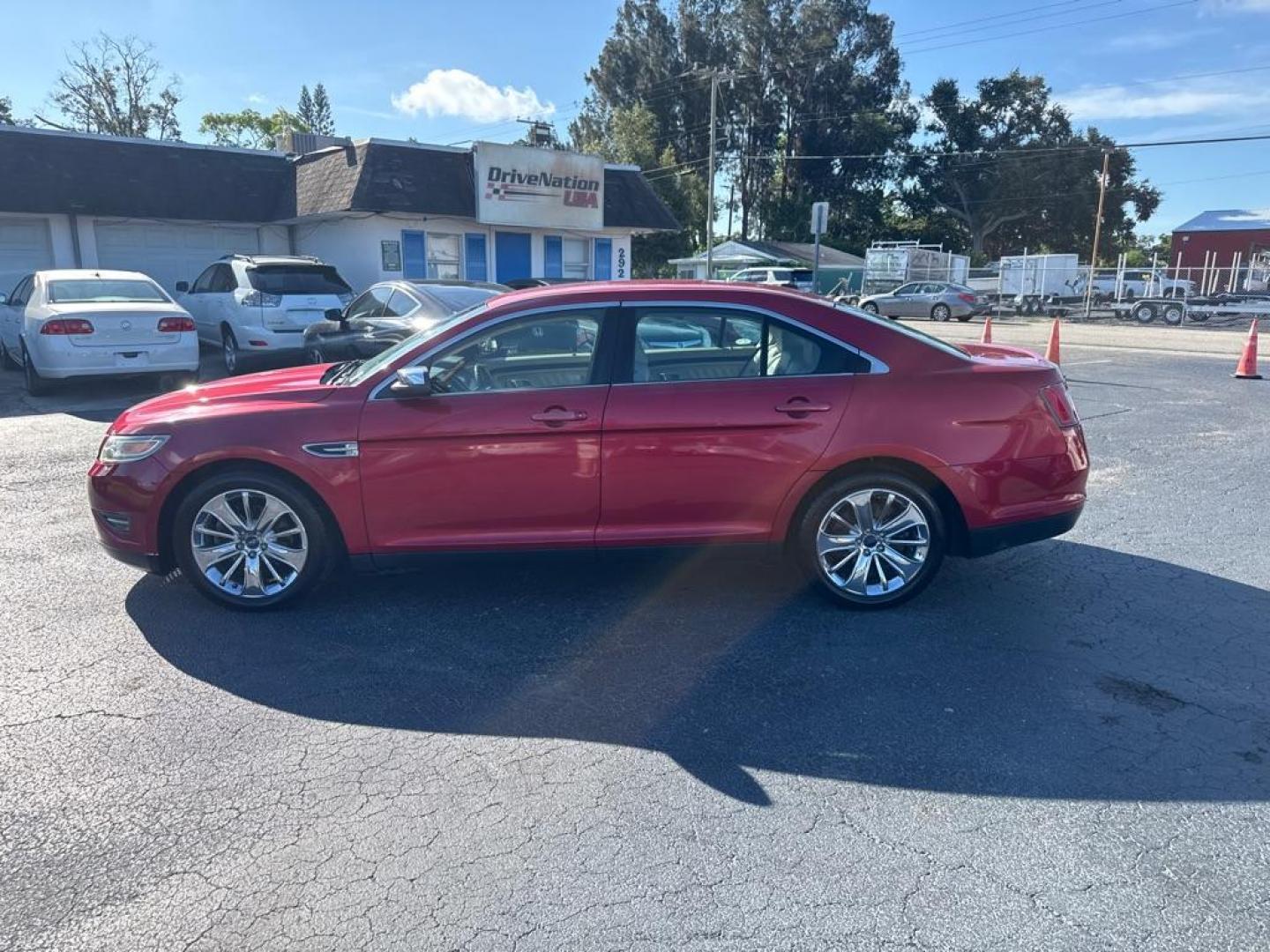 2011 RED FORD TAURUS LIMITED (1FAHP2FW1BG) with an 3.5L engine, Automatic transmission, located at 2929 9th St. West, Bradenton, 34205, (941) 242-2810, 27.473591, -82.570679 - Thanks for inquring into DriveNation USA! All vehicles listed can be viewed at www.drivenationusa.com for vehicle history reports and additonal info. We cannot quote any terms such as down payments or monthly payments without an application. You can apply directly at www.drivenationusa.com or by con - Photo#6