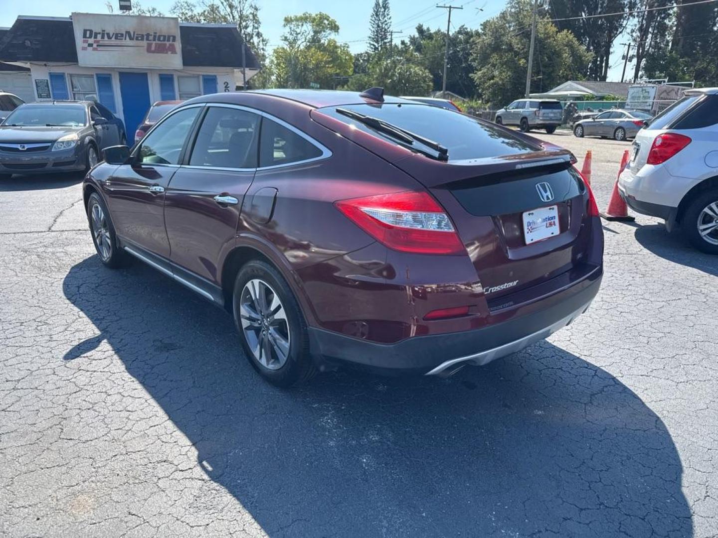2015 RED HONDA CROSSTOUR EX (5J6TF1H37FL) with an 3.5L engine, Automatic transmission, located at 2929 9th St. West, Bradenton, 34205, (941) 242-2810, 27.473591, -82.570679 - Thanks for inquring into DriveNation USA! All vehicles listed can be viewed at www.drivenationusa.com for vehicle history reports and additonal info. We cannot quote any terms such as down payments or monthly payments without an application. You can apply directly at www.drivenationusa.com or by con - Photo#5