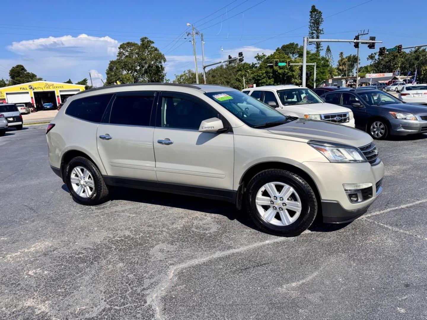 2014 GOLD CHEVROLET TRAVERSE LT (1GNKRGKD0EJ) with an 3.6L engine, Automatic transmission, located at 2929 9th St. West, Bradenton, 34205, (941) 242-2810, 27.473591, -82.570679 - Thanks for inquring into DriveNation USA! All vehicles listed can be viewed at www.drivenationusa.com for vehicle history reports and additonal info. We cannot quote any terms such as down payments or monthly payments without an application. You can apply directly at www.drivenationusa.com or by con - Photo#1