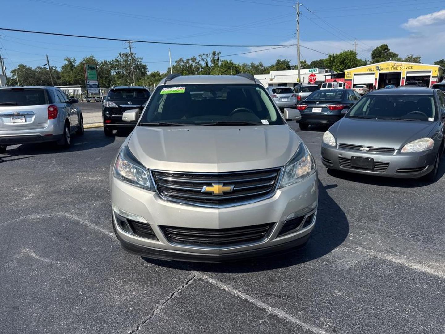 2014 GOLD CHEVROLET TRAVERSE LT (1GNKRGKD0EJ) with an 3.6L engine, Automatic transmission, located at 2929 9th St. West, Bradenton, 34205, (941) 242-2810, 27.473591, -82.570679 - Thanks for inquring into DriveNation USA! All vehicles listed can be viewed at www.drivenationusa.com for vehicle history reports and additonal info. We cannot quote any terms such as down payments or monthly payments without an application. You can apply directly at www.drivenationusa.com or by con - Photo#2
