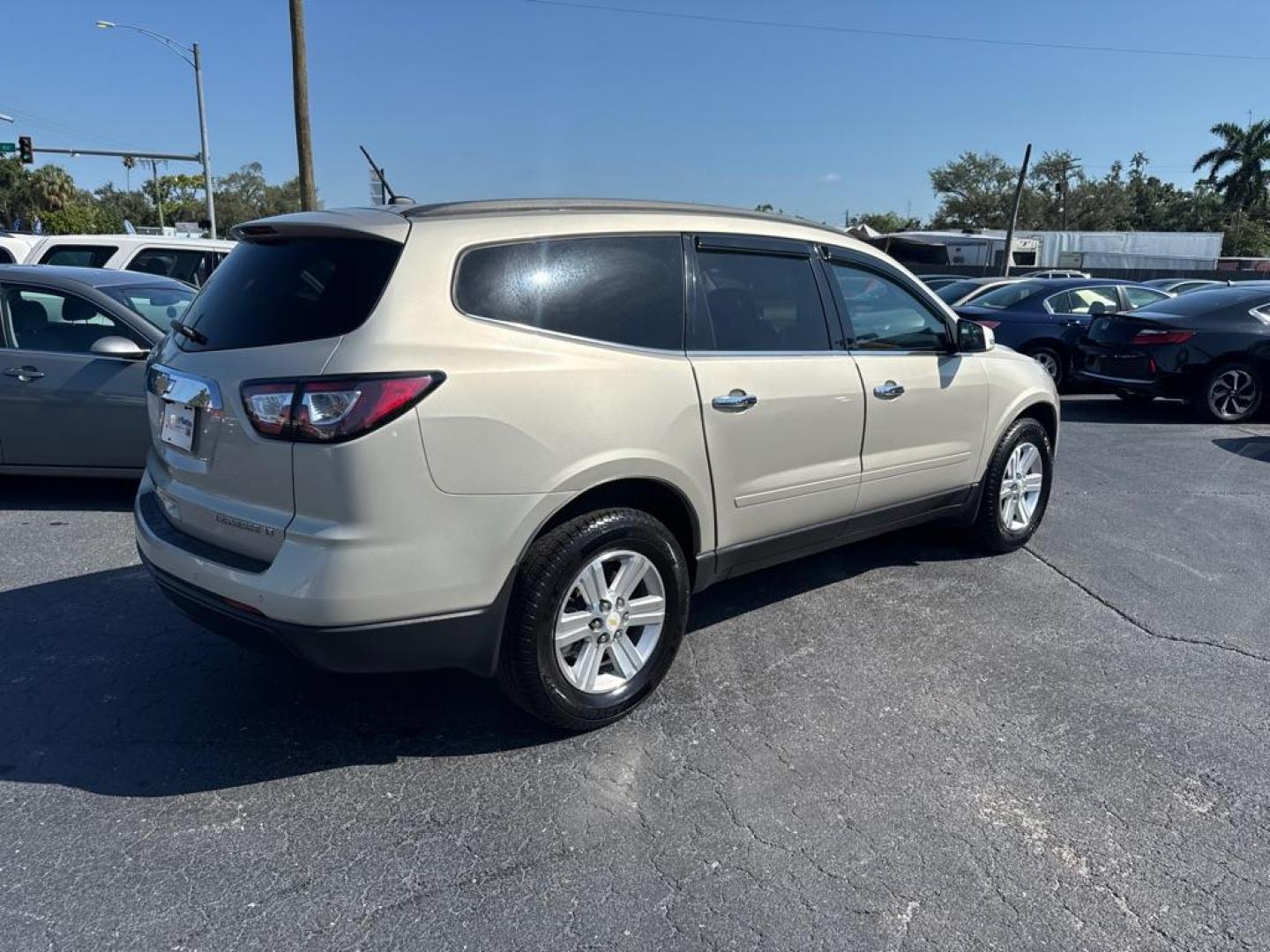 2014 GOLD CHEVROLET TRAVERSE LT (1GNKRGKD0EJ) with an 3.6L engine, Automatic transmission, located at 2929 9th St. West, Bradenton, 34205, (941) 242-2810, 27.473591, -82.570679 - Thanks for inquring into DriveNation USA! All vehicles listed can be viewed at www.drivenationusa.com for vehicle history reports and additonal info. We cannot quote any terms such as down payments or monthly payments without an application. You can apply directly at www.drivenationusa.com or by con - Photo#6