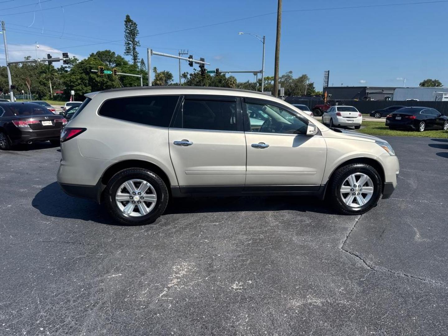 2014 GOLD CHEVROLET TRAVERSE LT (1GNKRGKD0EJ) with an 3.6L engine, Automatic transmission, located at 2929 9th St. West, Bradenton, 34205, (941) 242-2810, 27.473591, -82.570679 - Thanks for inquring into DriveNation USA! All vehicles listed can be viewed at www.drivenationusa.com for vehicle history reports and additonal info. We cannot quote any terms such as down payments or monthly payments without an application. You can apply directly at www.drivenationusa.com or by con - Photo#7