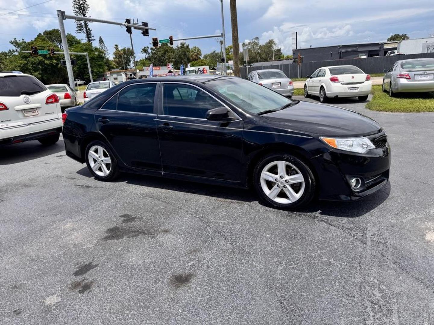 2014 BLACK TOYOTA CAMRY SE (4T1BF1FKXEU) with an 2.5L engine, Automatic transmission, located at 2929 9th St. West, Bradenton, 34205, (941) 242-2810, 27.473591, -82.570679 - Thanks for inquring into DriveNation USA! All vehicles listed can be viewed at www.drivenationusa.com for vehicle history reports and additonal info. We cannot quote any terms such as down payments or monthly payments without an application. You can apply directly at www.drivenationusa.com or by con - Photo#0
