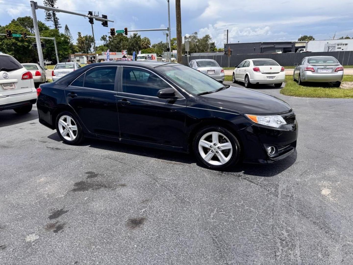 2014 BLACK TOYOTA CAMRY SE (4T1BF1FKXEU) with an 2.5L engine, Automatic transmission, located at 2929 9th St. West, Bradenton, 34205, (941) 242-2810, 27.473591, -82.570679 - Thanks for inquring into DriveNation USA! All vehicles listed can be viewed at www.drivenationusa.com for vehicle history reports and additonal info. We cannot quote any terms such as down payments or monthly payments without an application. You can apply directly at www.drivenationusa.com or by con - Photo#2