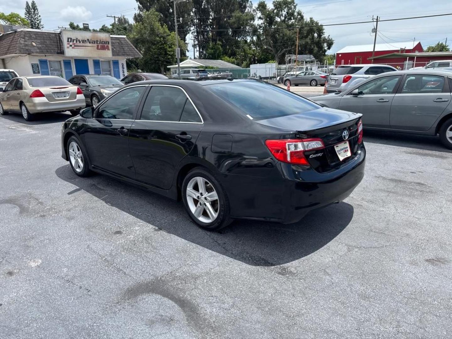 2014 BLACK TOYOTA CAMRY SE (4T1BF1FKXEU) with an 2.5L engine, Automatic transmission, located at 2929 9th St. West, Bradenton, 34205, (941) 242-2810, 27.473591, -82.570679 - Thanks for inquring into DriveNation USA! All vehicles listed can be viewed at www.drivenationusa.com for vehicle history reports and additonal info. We cannot quote any terms such as down payments or monthly payments without an application. You can apply directly at www.drivenationusa.com or by con - Photo#6